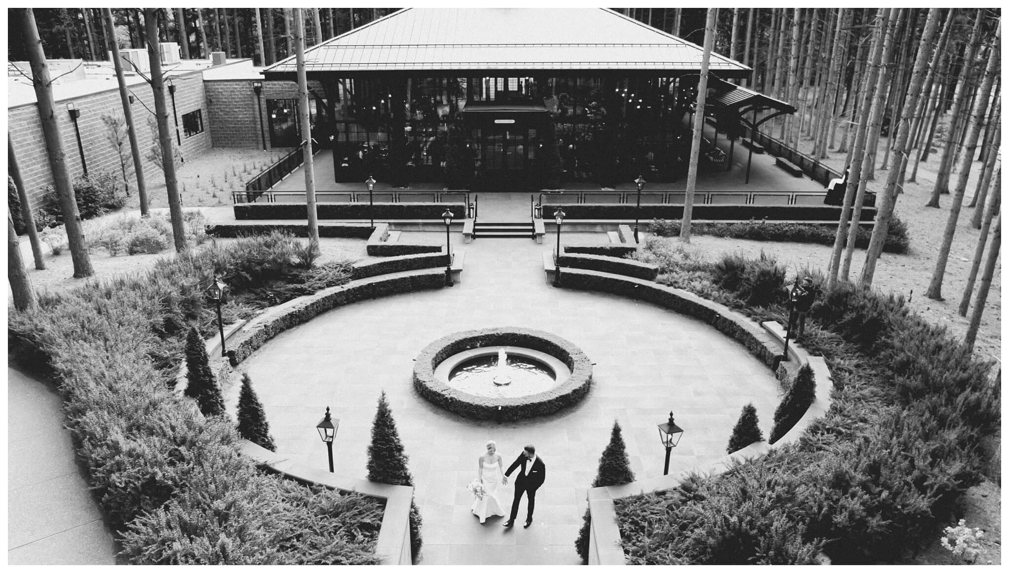 iconic black and white wedding in a forest at shepherds hollow gold club near detroit michigan by josh and andrea photography 