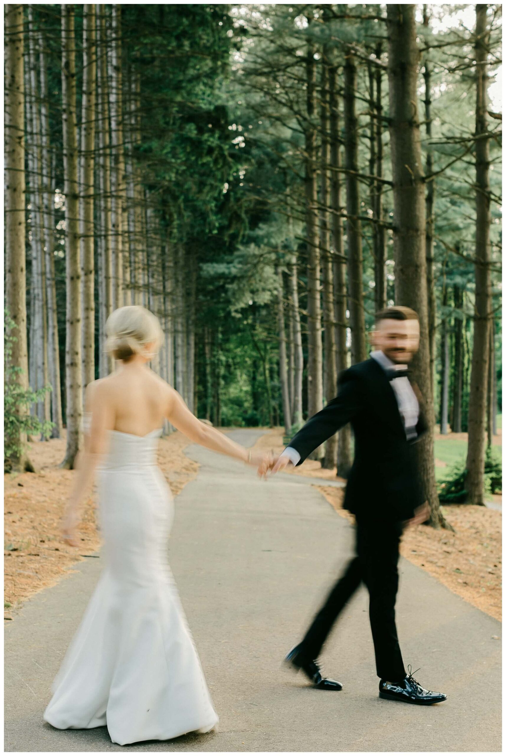 iconic black and white wedding in a forest at shepherds hollow gold club near detroit michigan by josh and andrea photography 