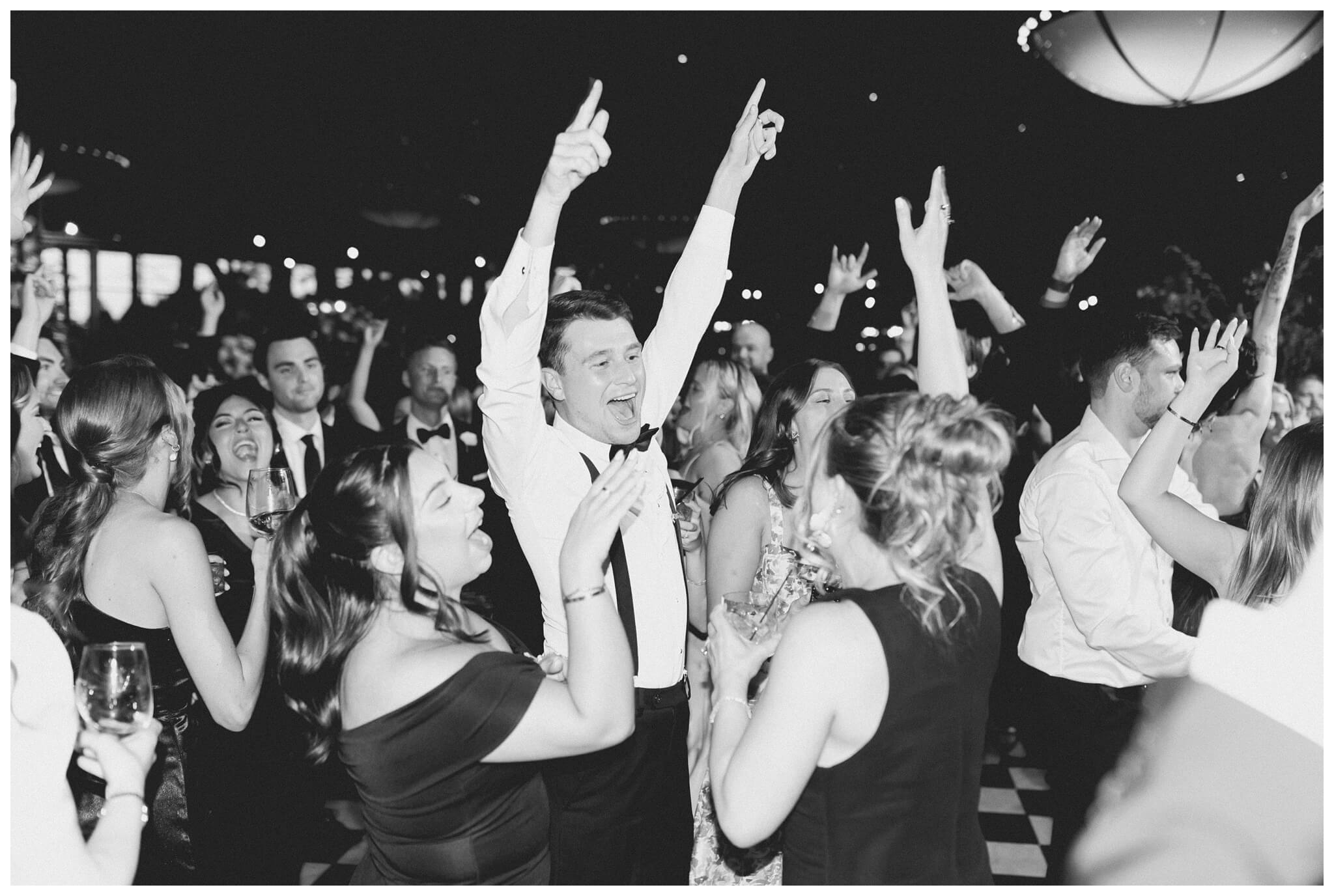 iconic black and white wedding in a forest at shepherds hollow gold club near detroit michigan by josh and andrea photography 