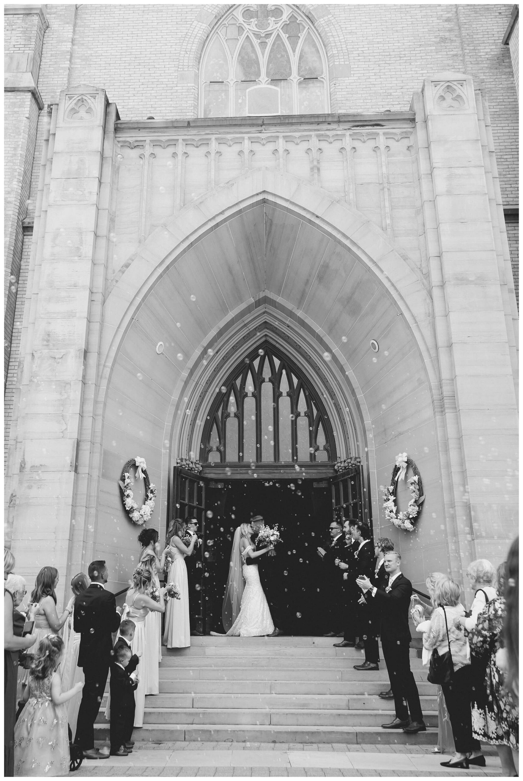 romantic catholic church wedding in downtown grand rapids michigan at the high five gr by josh and andrea photography
