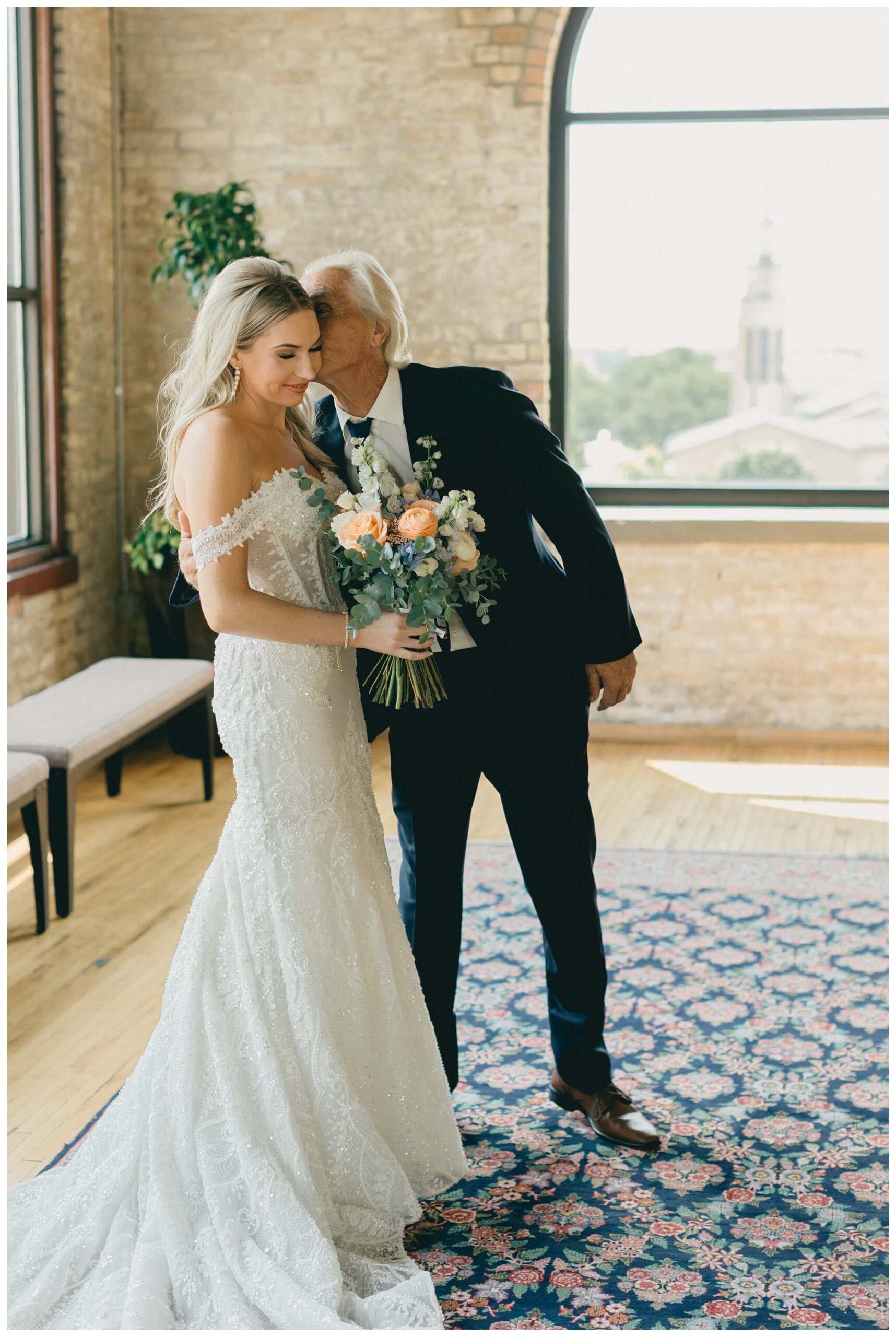 romantic catholic church wedding in downtown grand rapids michigan at the high five gr by josh and andrea photography