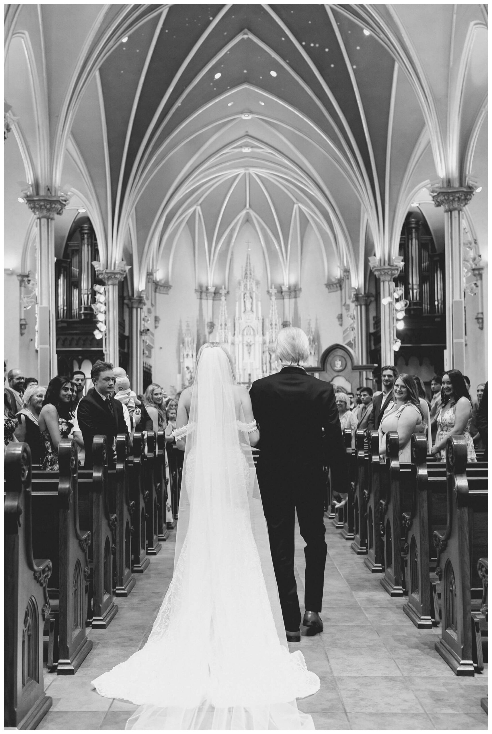 romantic catholic church wedding in downtown grand rapids michigan at the high five gr by josh and andrea photography