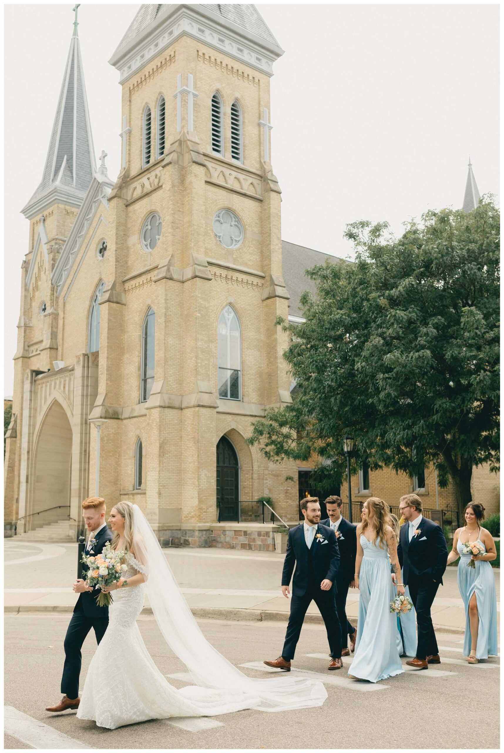 romantic catholic church wedding in downtown grand rapids michigan at the high five gr by josh and andrea photography