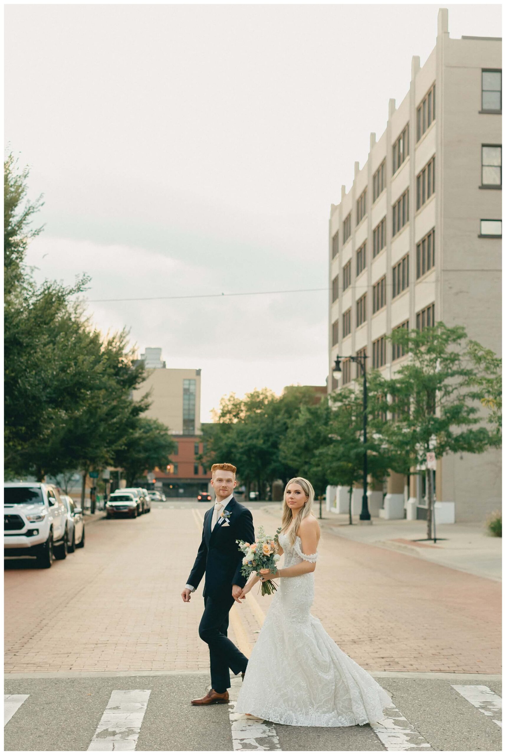 romantic catholic church wedding in downtown grand rapids michigan at the high five gr by josh and andrea photography