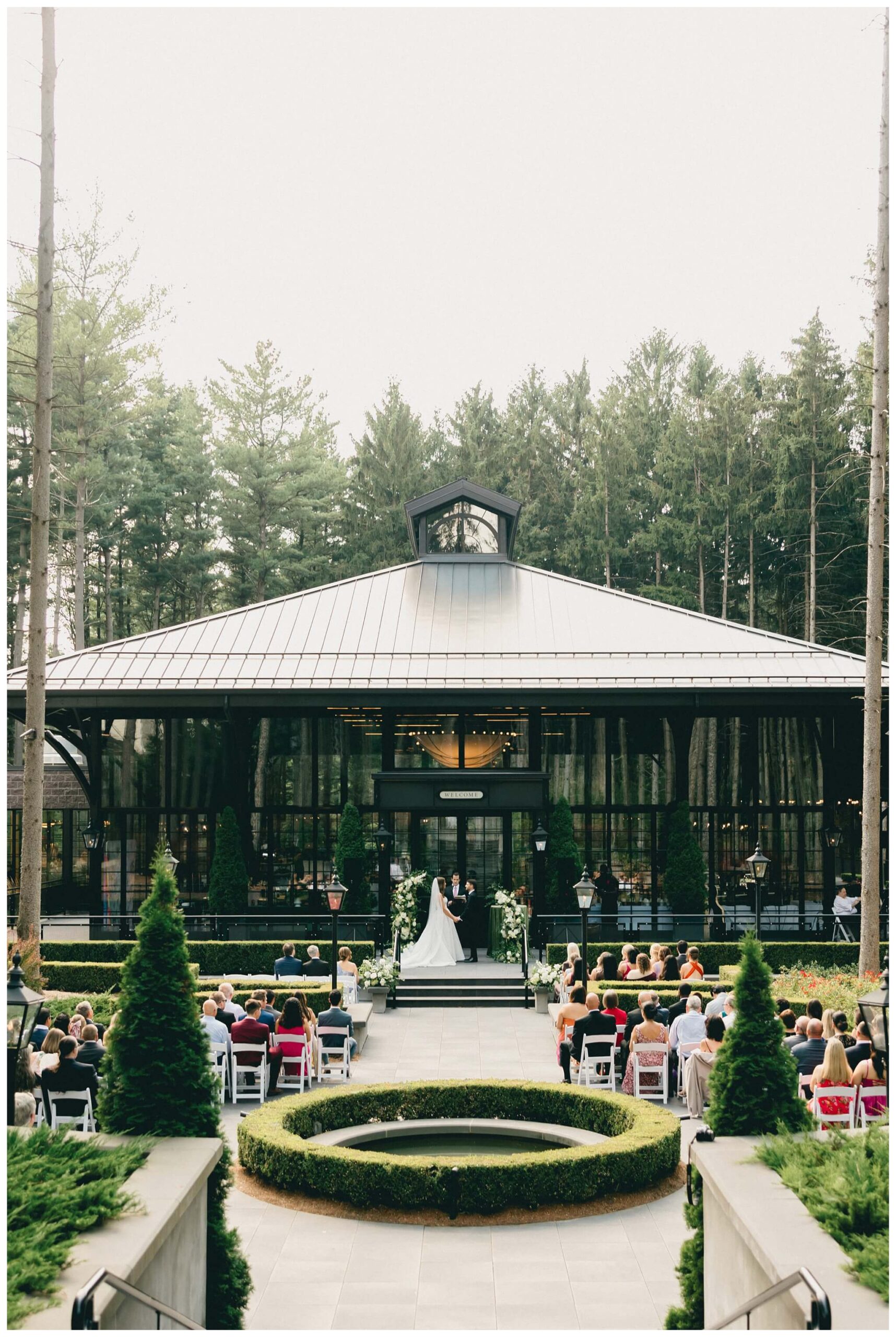 iconic black tie serbian wedding in the forest at shepherds hollow near detroit michigan by josh and andrea photography 
