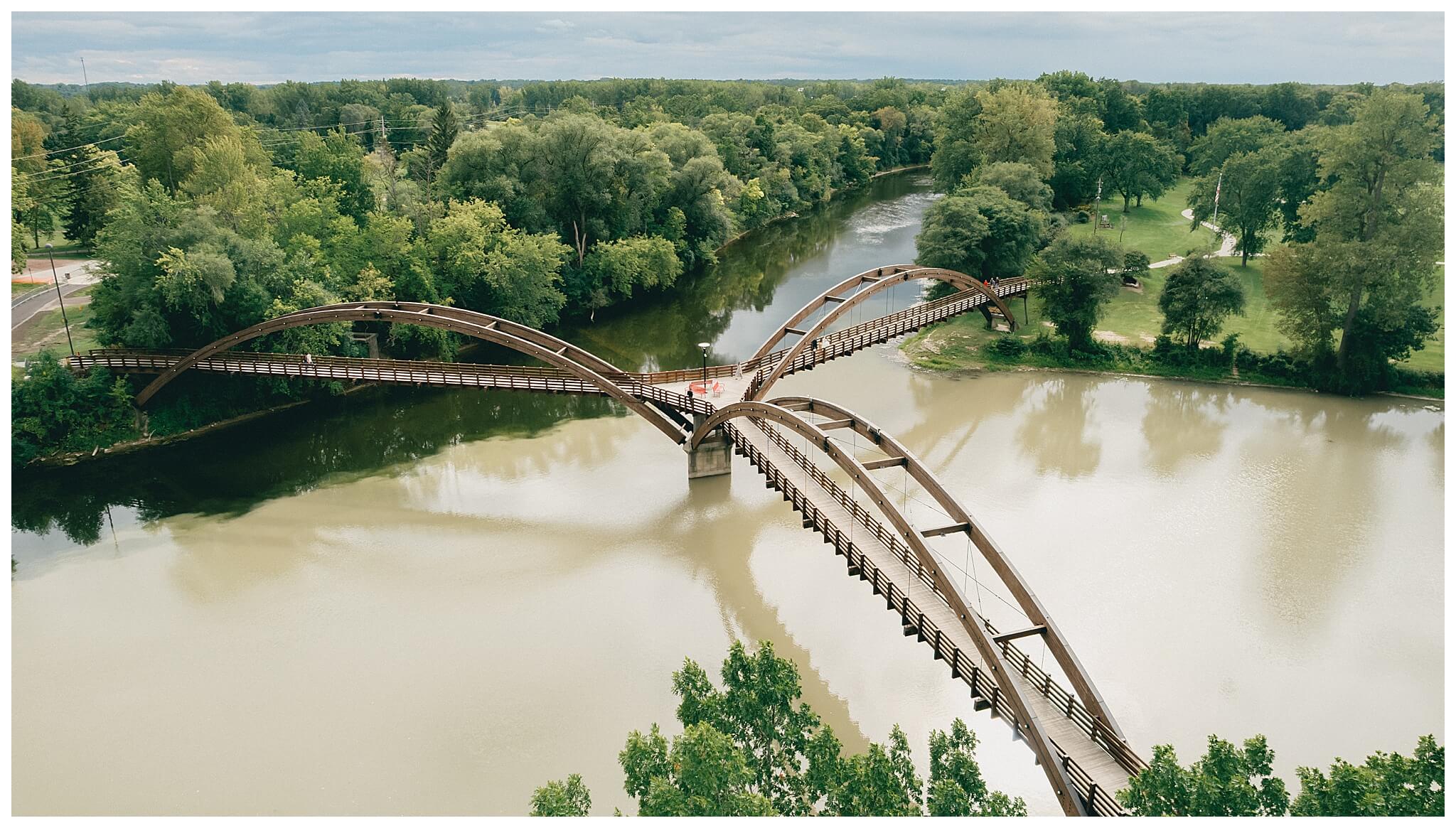 beautiful wedding photography near the Tridge at the H Hotel in midland michigan by josh and andrea photography