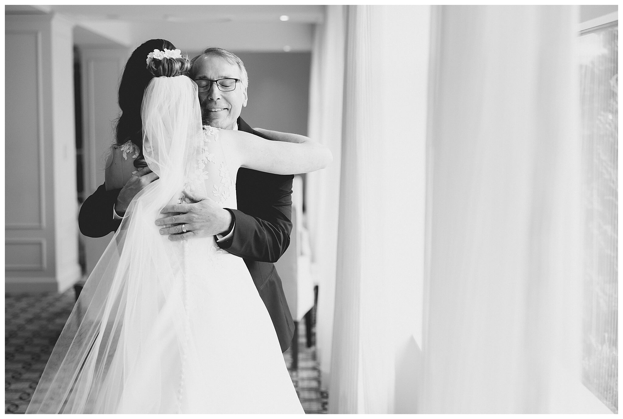 beautiful wedding photography near the Tridge at the H Hotel in midland michigan by josh and andrea photography
