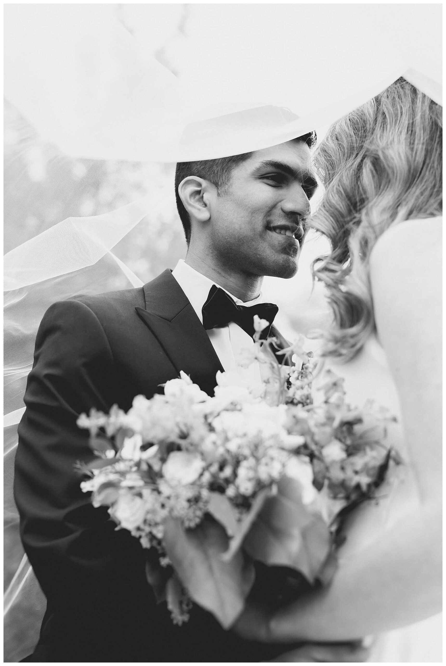 beautiful wedding photography near the Tridge at the H Hotel in midland michigan by josh and andrea photography
