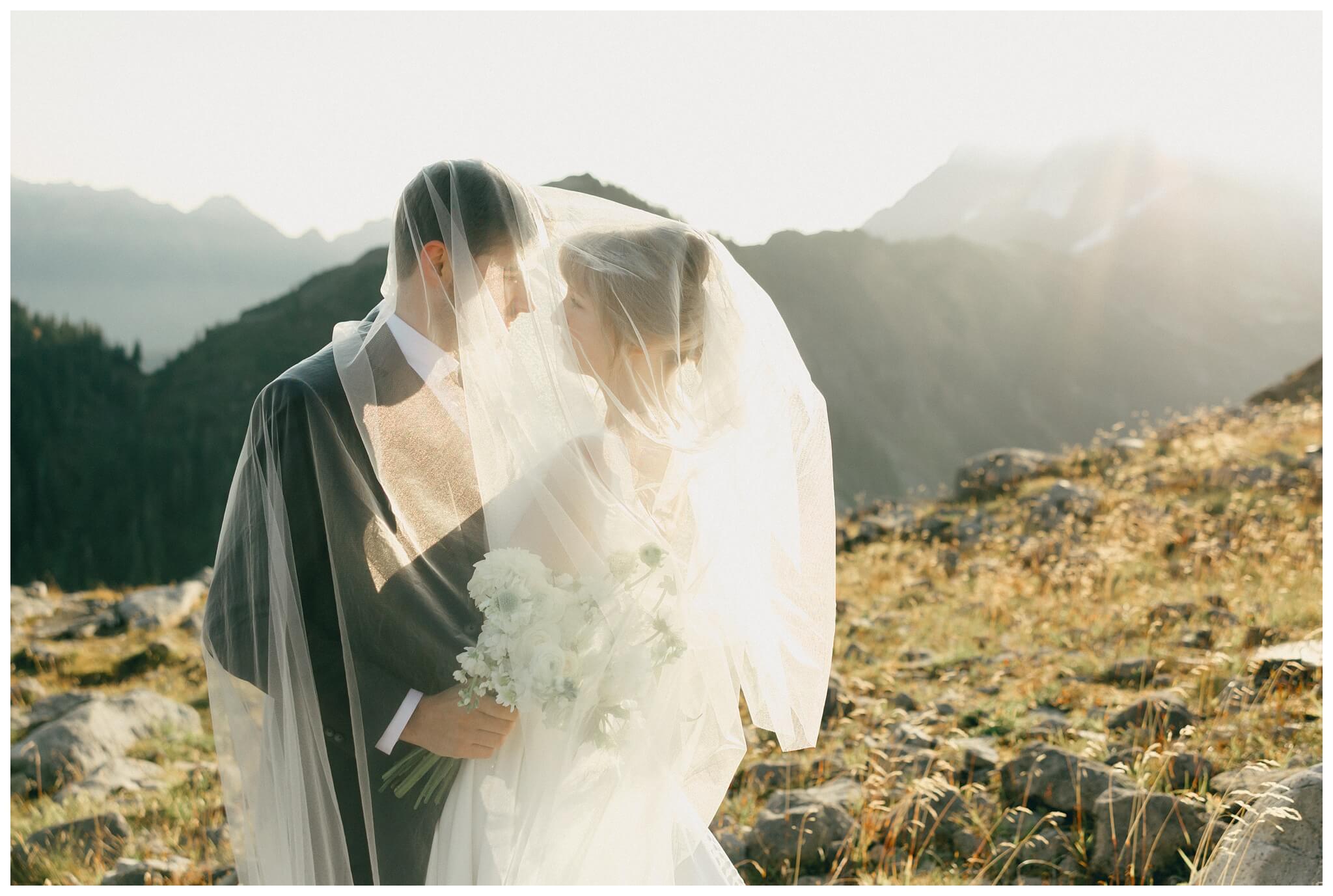 epic mountain top sunrise wedding near mount baker at artist point hiking trail in deming washington by josh and andrea photography