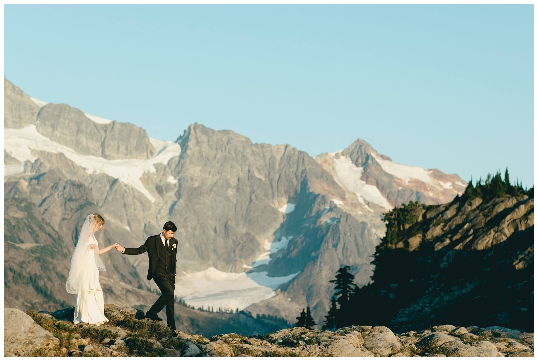 epic mountain top sunrise wedding near mount baker at artist point hiking trail in deming washington by josh and andrea photography