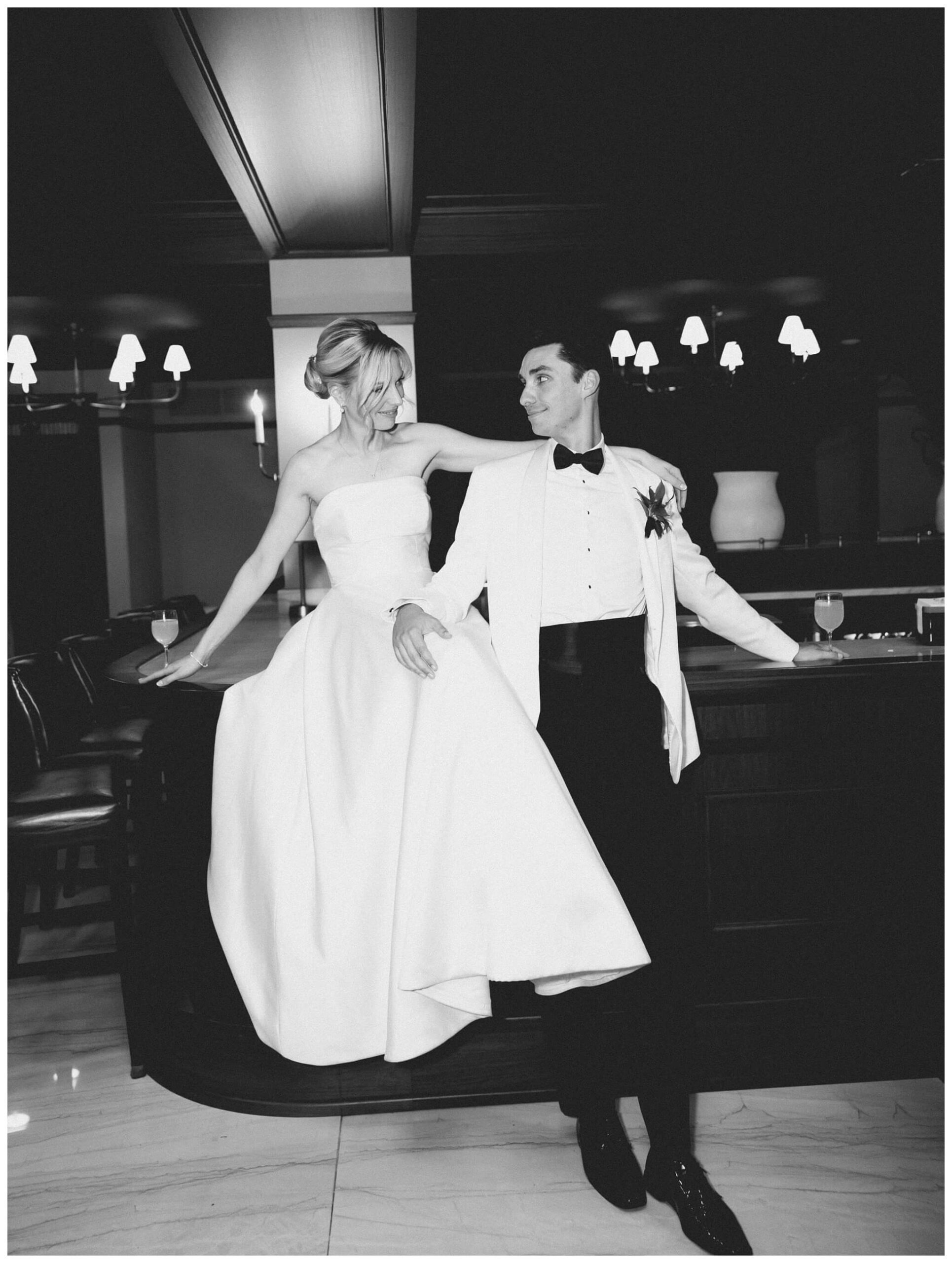 Bride and groom pose at Colony Club wedding