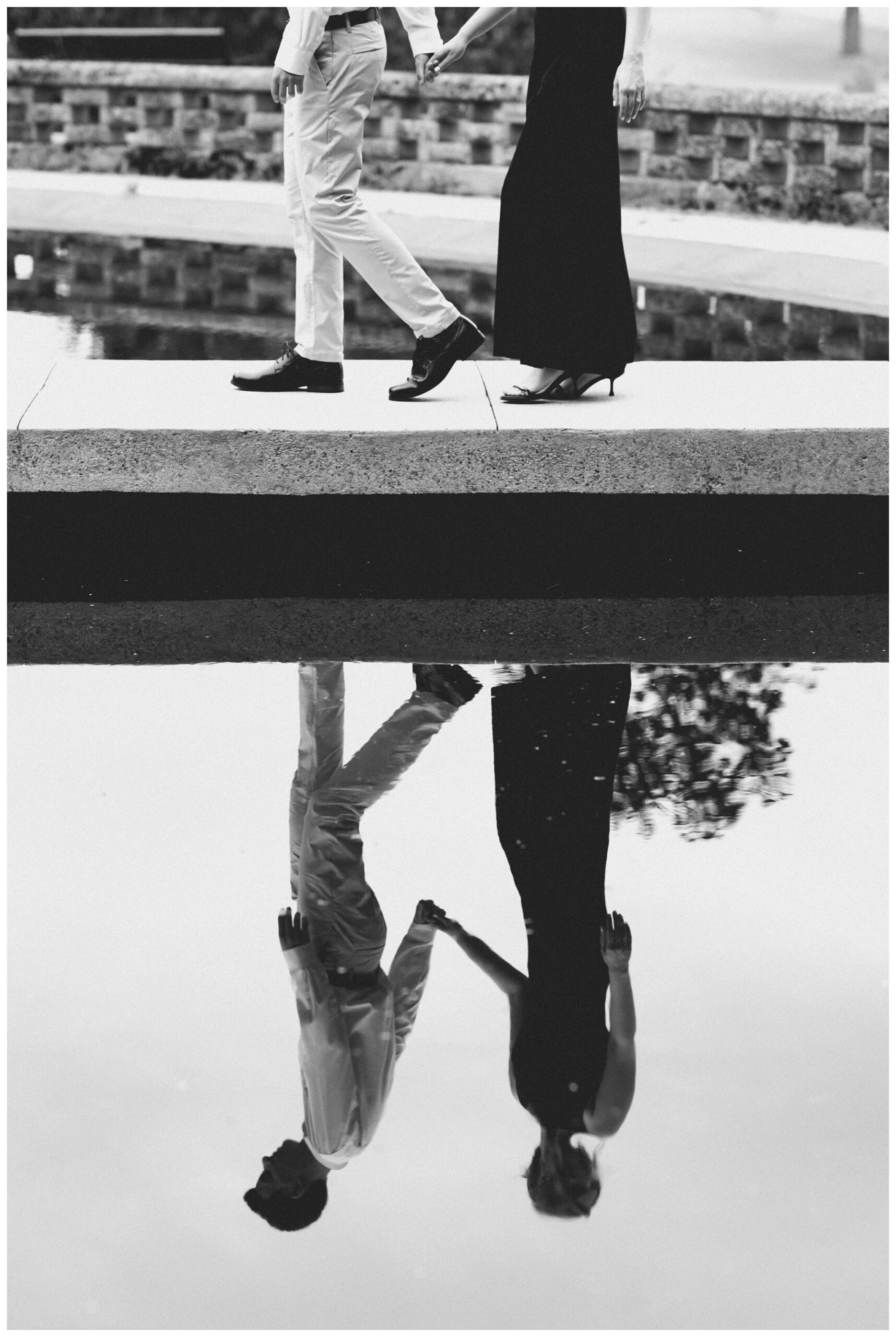 classy refined date night engagement shoot at felt estate with a black dress by josh and andrea photography