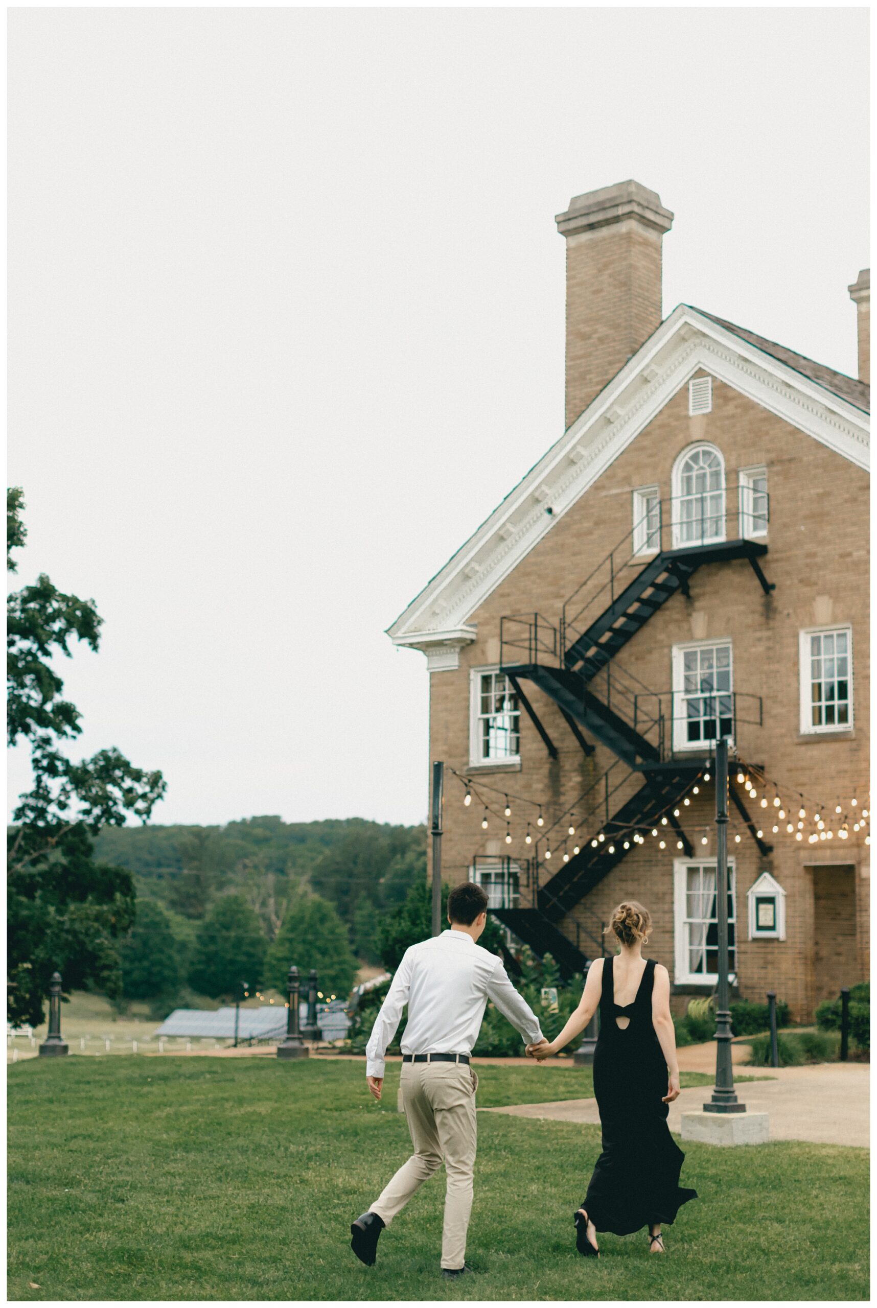 classy refined date night engagement shoot at felt estate with a black dress by josh and andrea photography