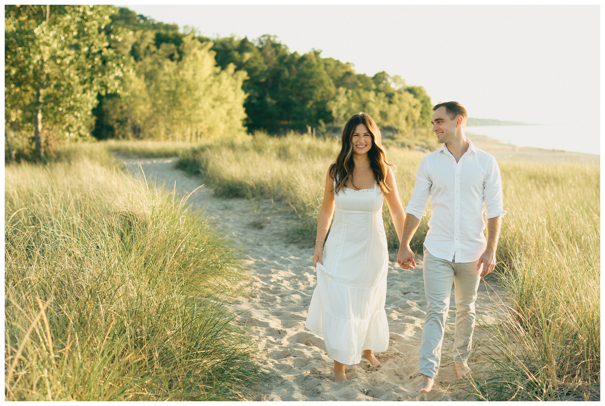 beautiful evening beach lakeside engagement shoot at warren dunes state park near new buffalo michigan by josh and andrea photography