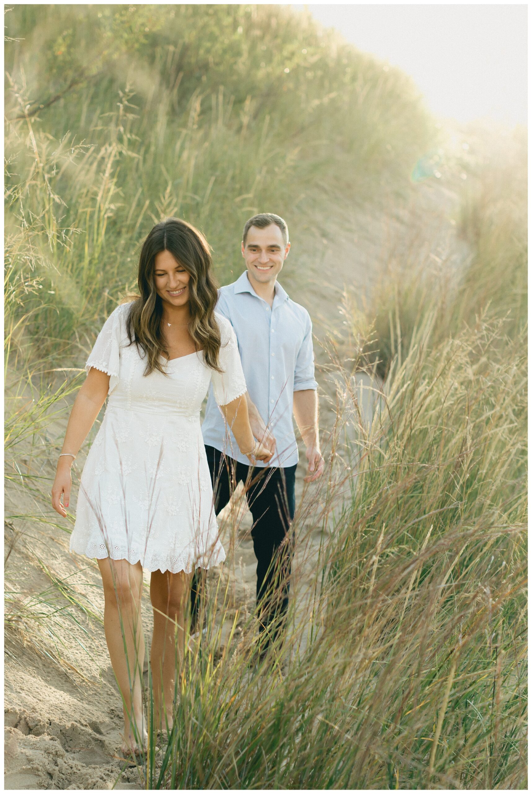 beautiful evening beach lakeside engagement shoot at warren dunes state park near new buffalo michigan by josh and andrea photography