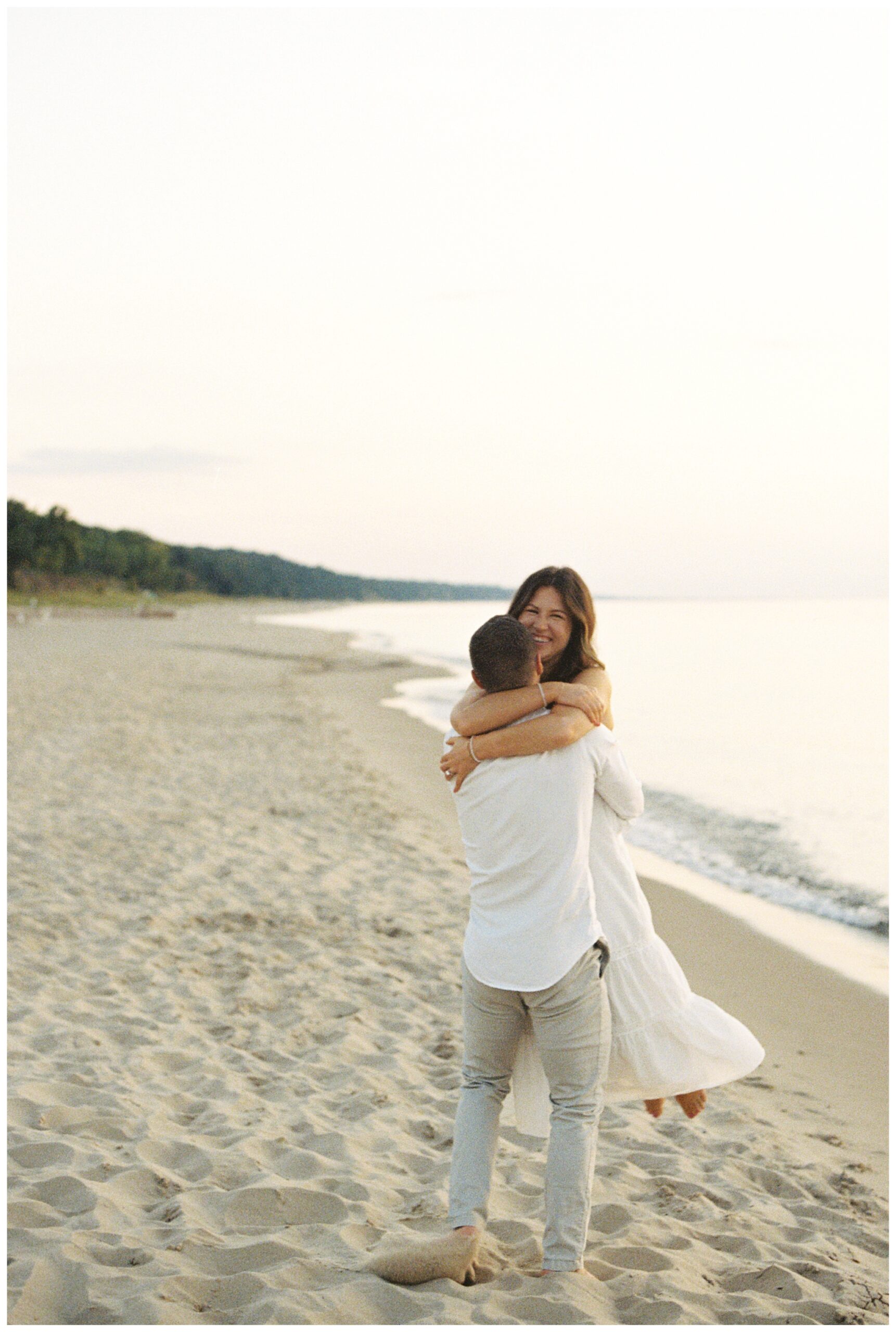 beautiful evening beach lakeside engagement shoot at warren dunes state park near new buffalo michigan by josh and andrea photography
