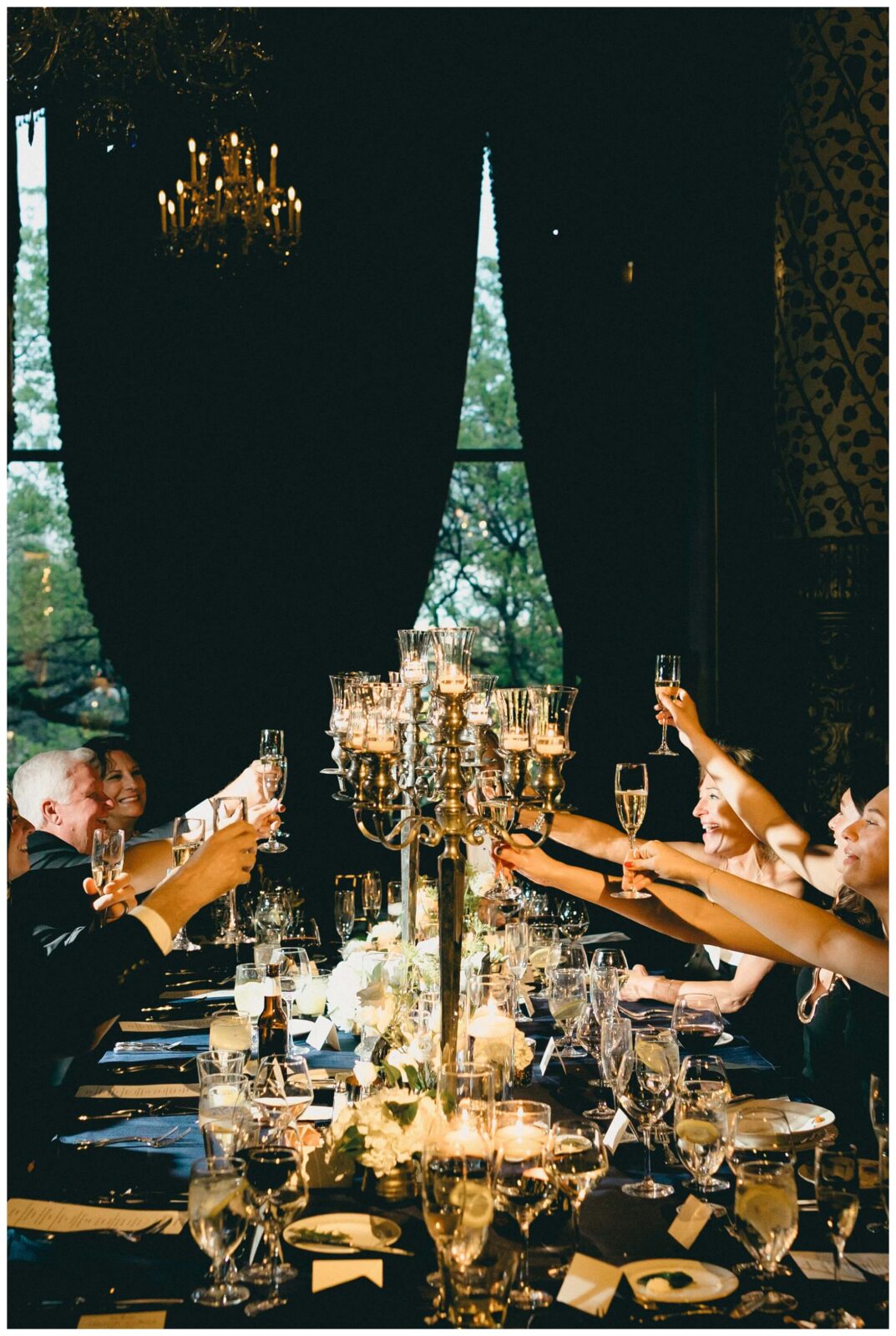 Guests toast to the newlyweds at The Drake Hotel gold coast ballroom