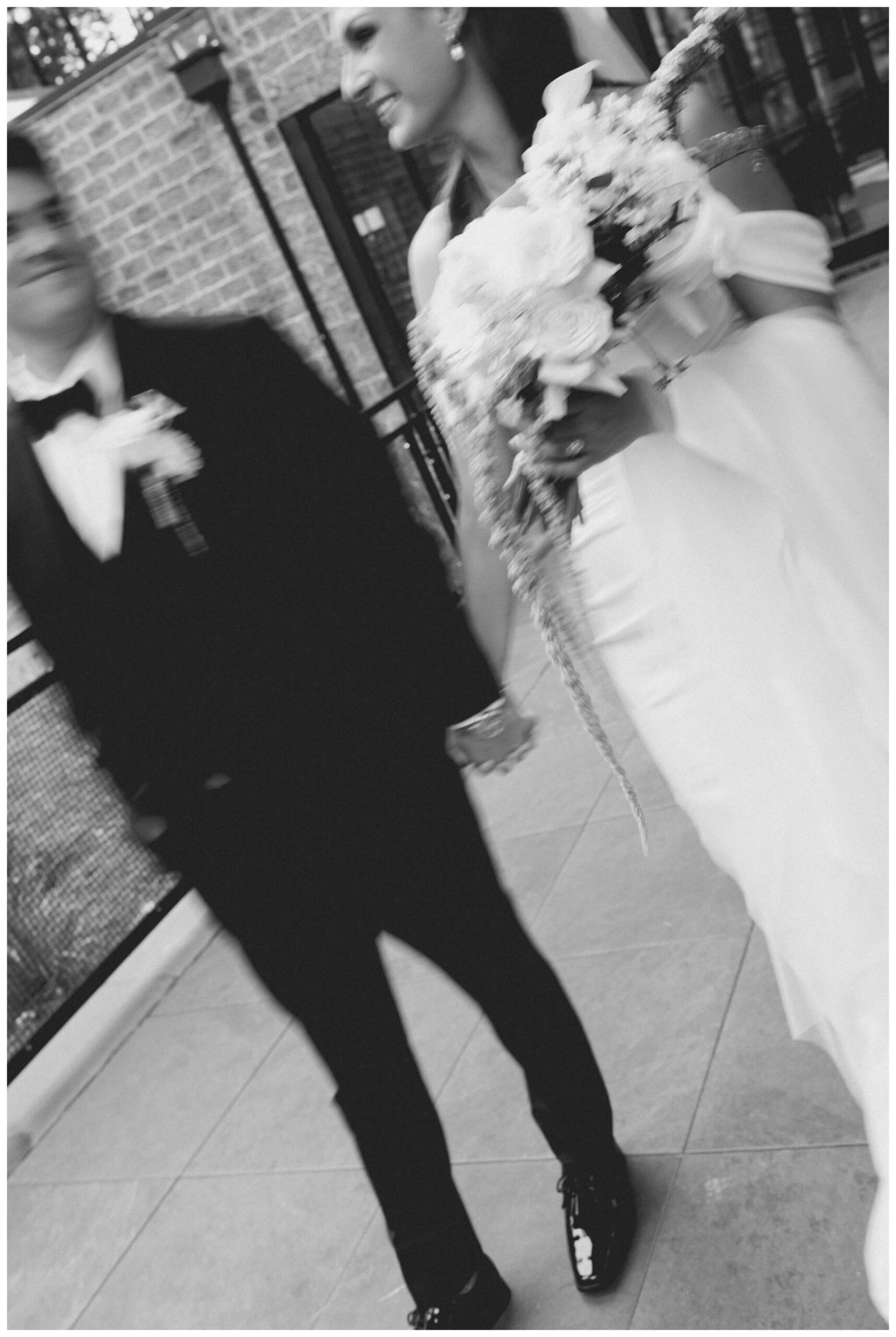 bride and groom walking at Shepherd's Hollow on their wedding day photographed by josh and andrea photography 