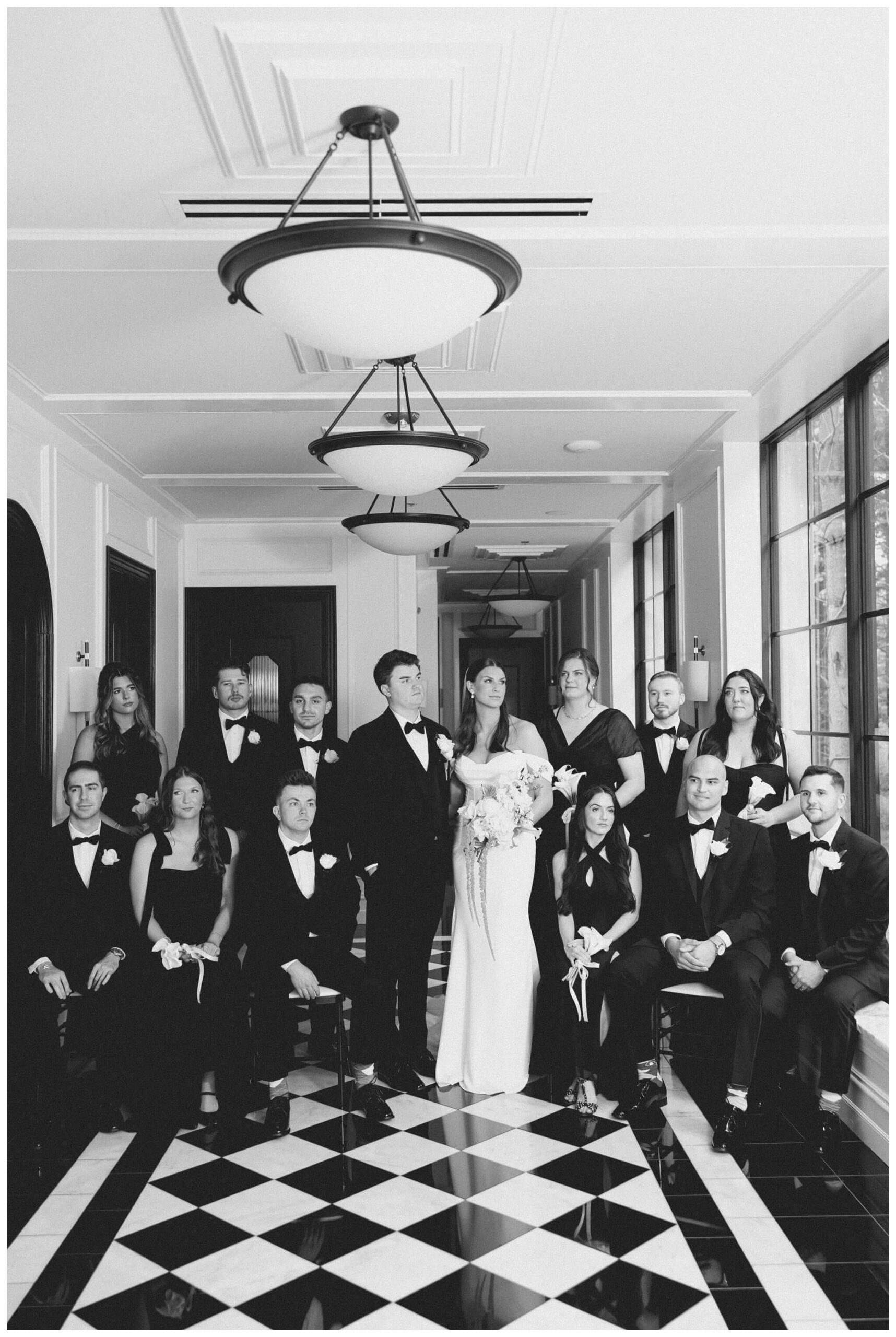 bridal party in the hallway at Shepherd's Hollow on a rainy wedding day photographed by josh and andrea photography 