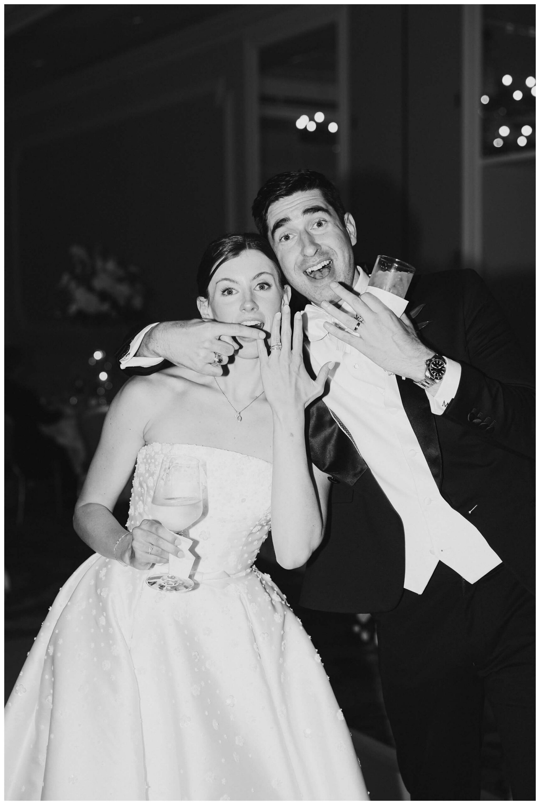 bride and groom celebrate their wedding at Notre dame indiana by josh and andrea photography