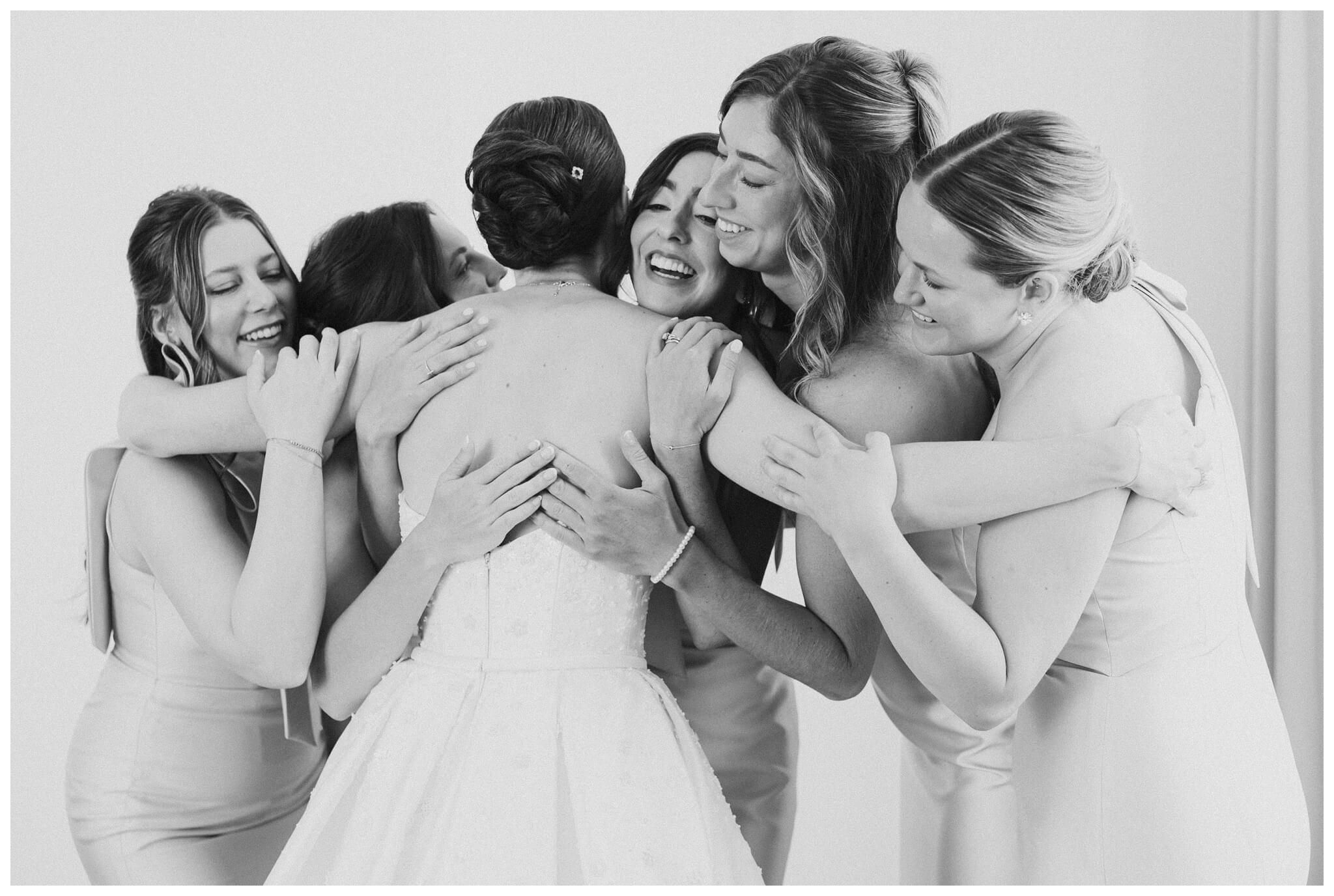 bride and bridesmaids at Notre dame indiana by josh and andrea photography