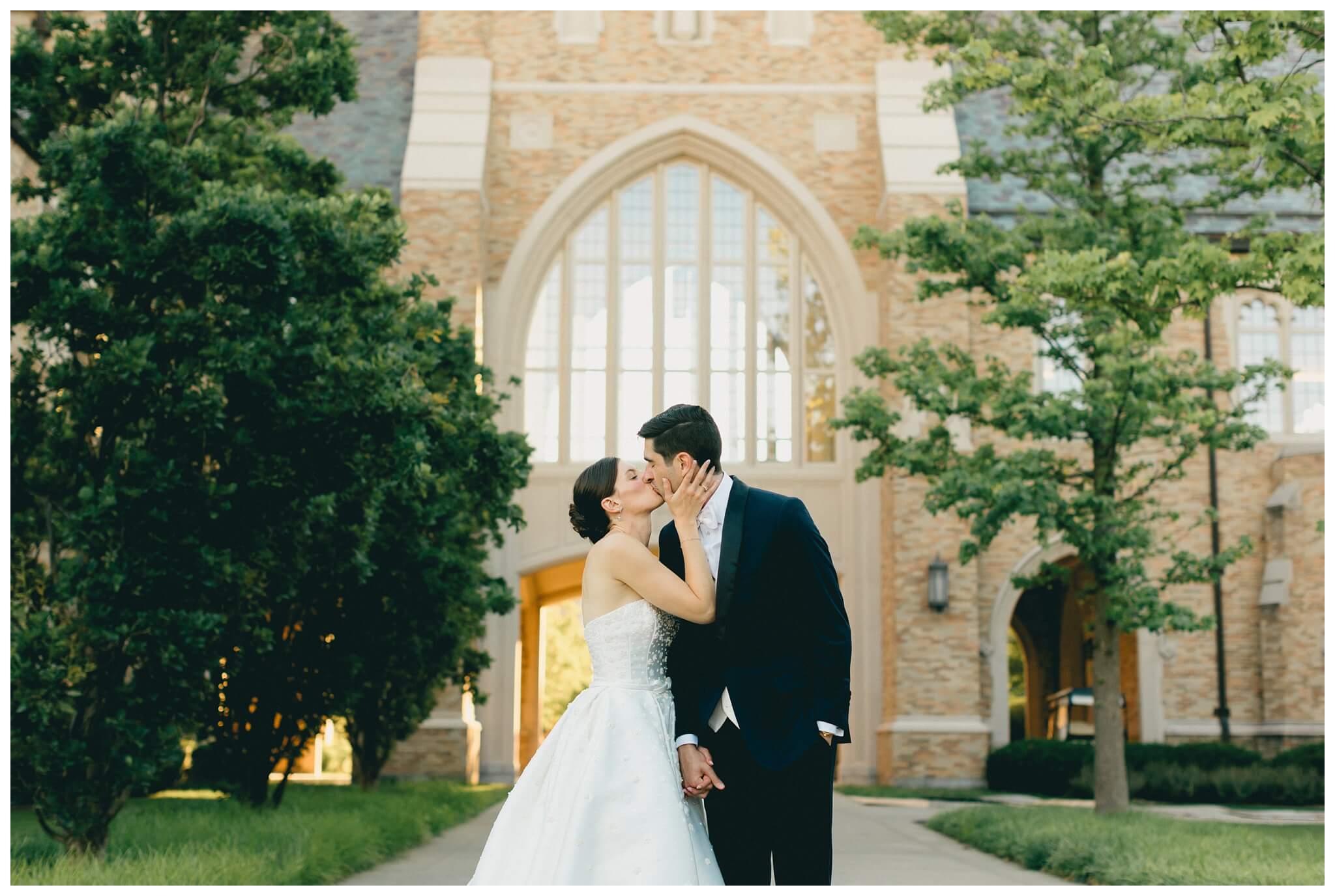 bride and groom golden hour golden hour portraits near the law school at Notre dame indiana by josh and andrea photography