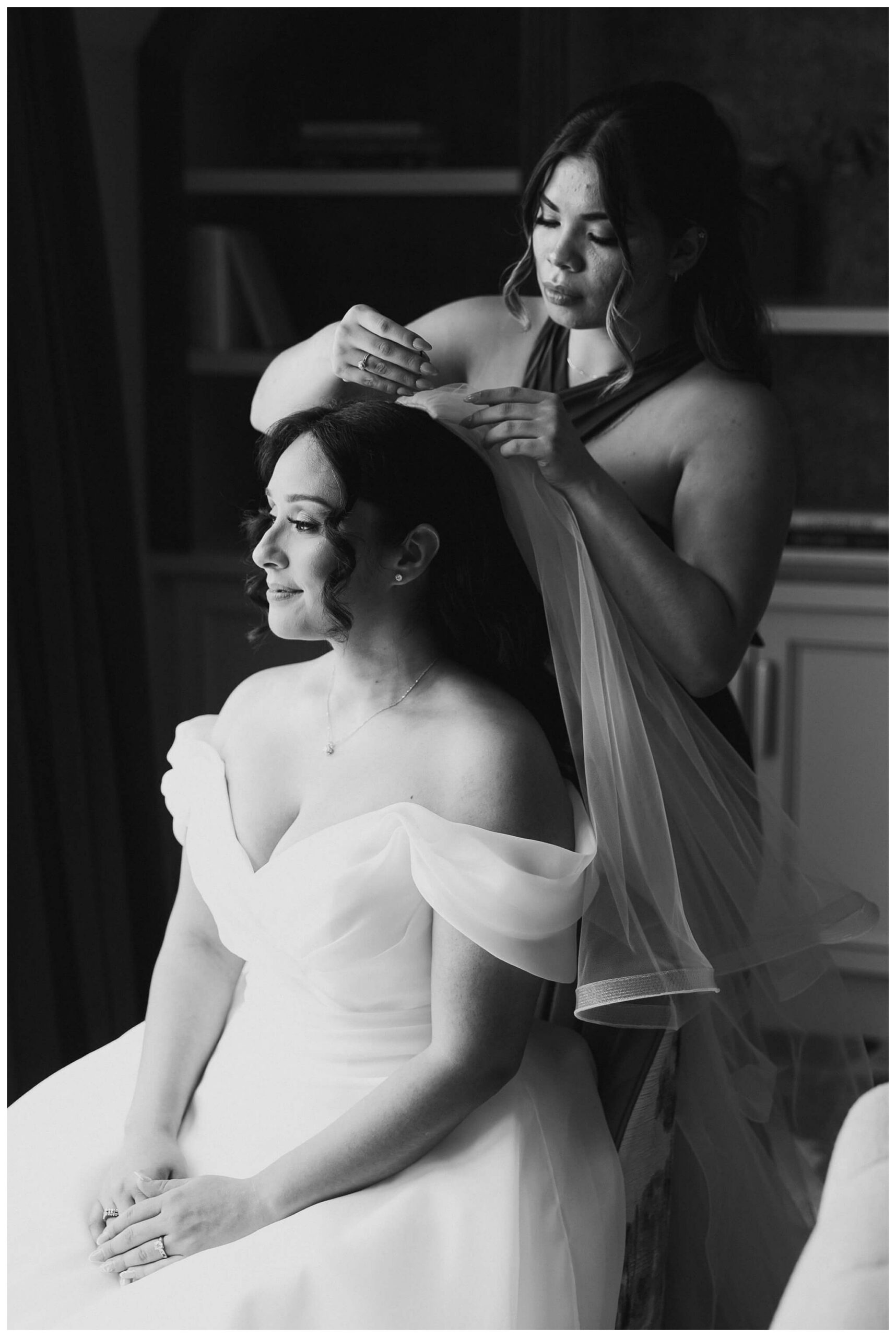 bride getting ready at royal park hotel in rochester michigan by josh and andrea photography 