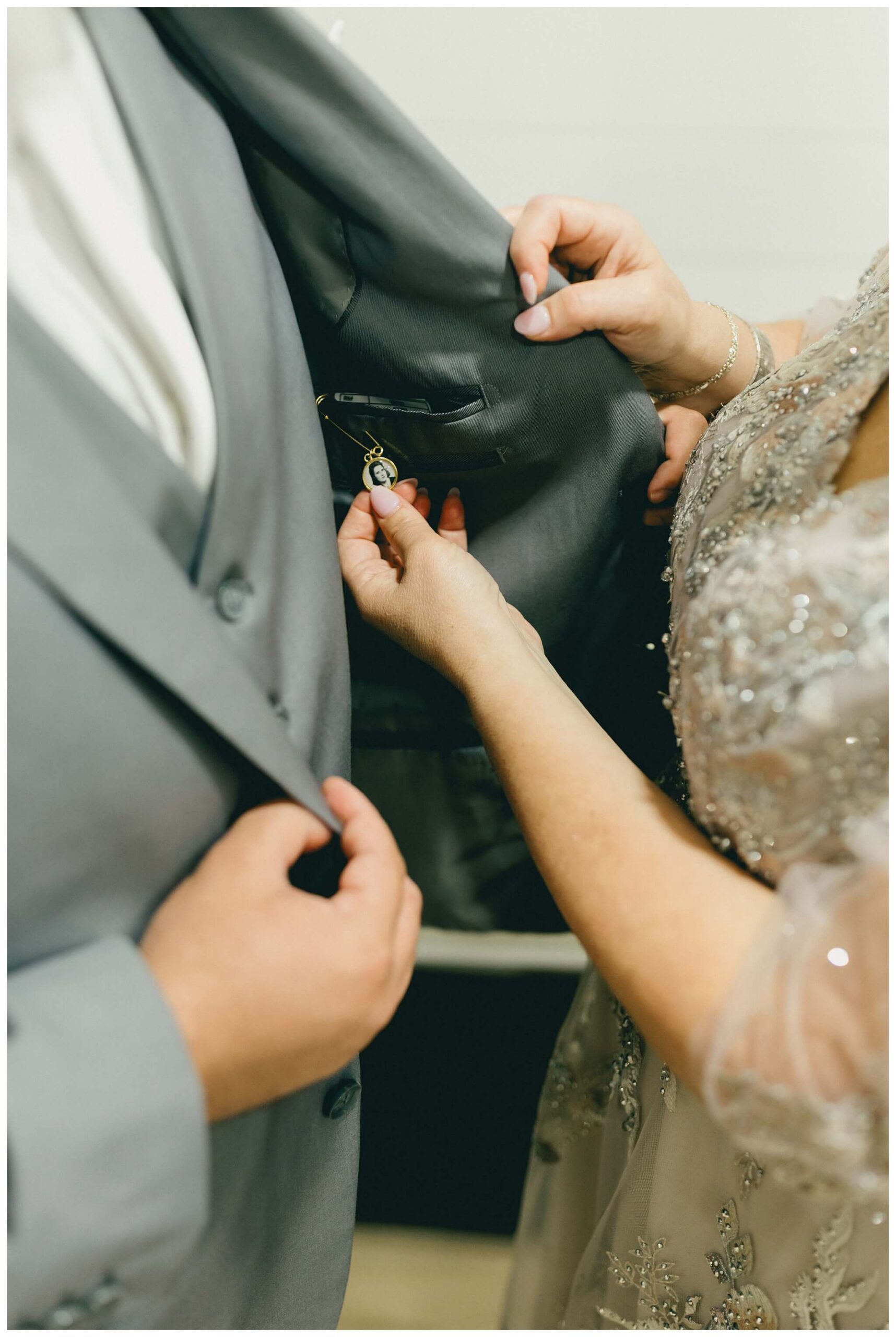 groom getting ready at royal park hotel in rochester michigan by josh and andrea photography 