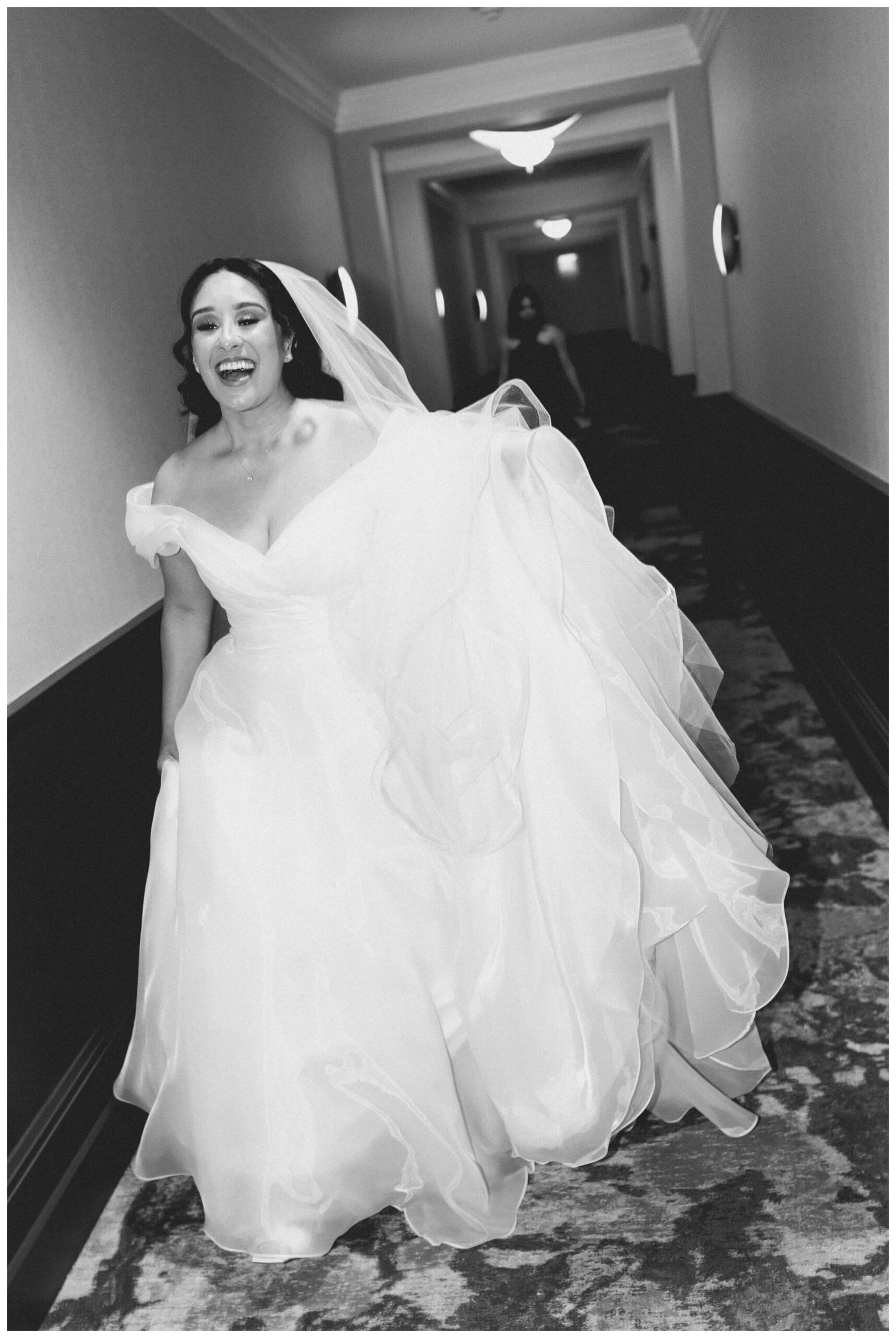 bride getting ready at royal park hotel in rochester michigan by josh and andrea photography 