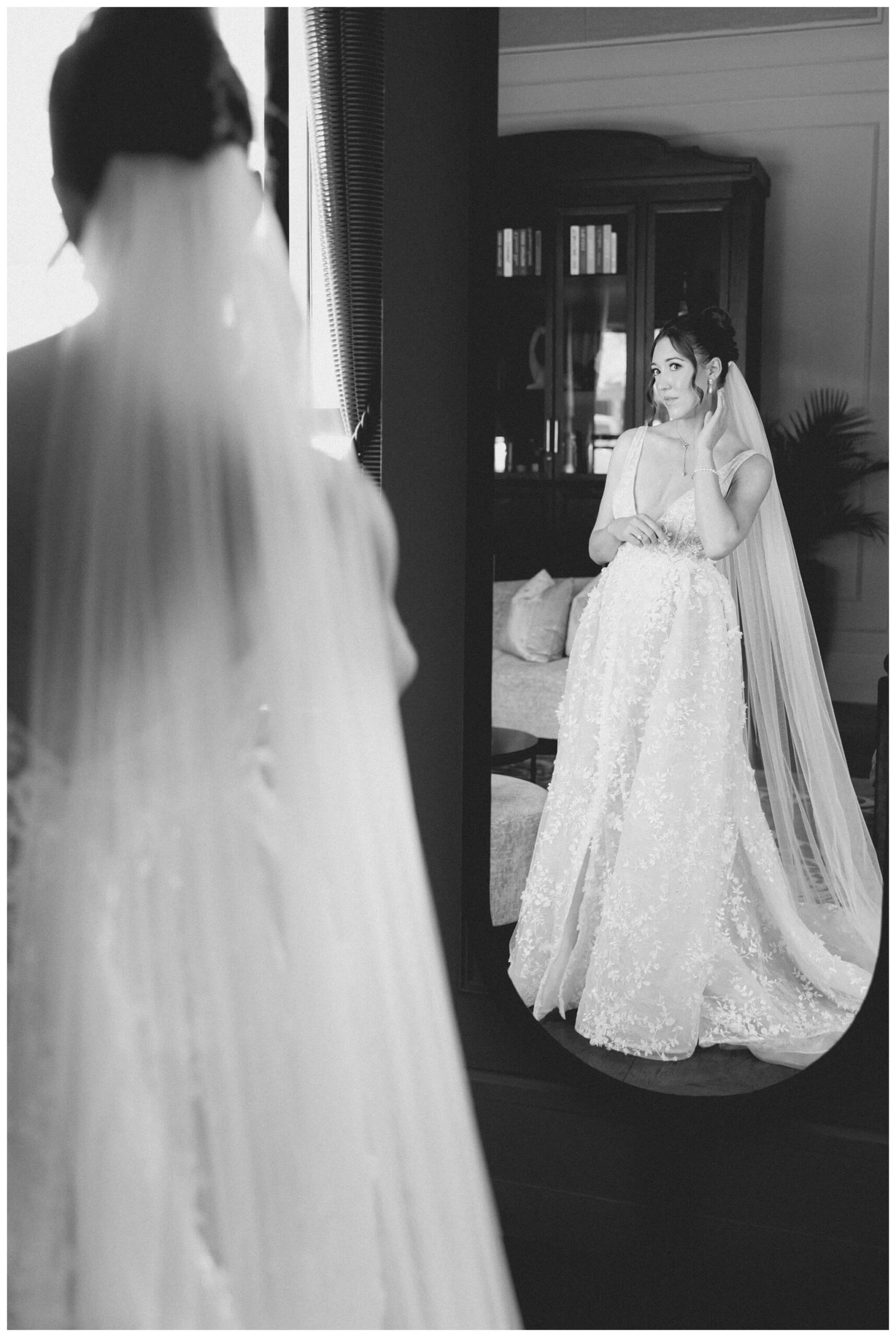bride getting ready at the Daxton Hotel in Birmingham michigan by josh and andrea photography 