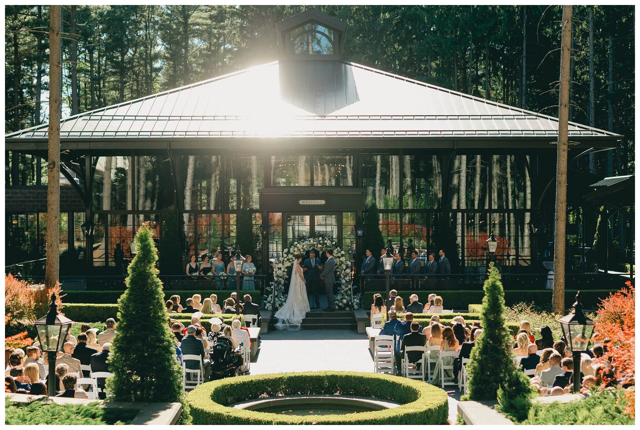 sunny ceremony at shepherd's hollow golf club in clarkston michigan by josh and andrea photography 