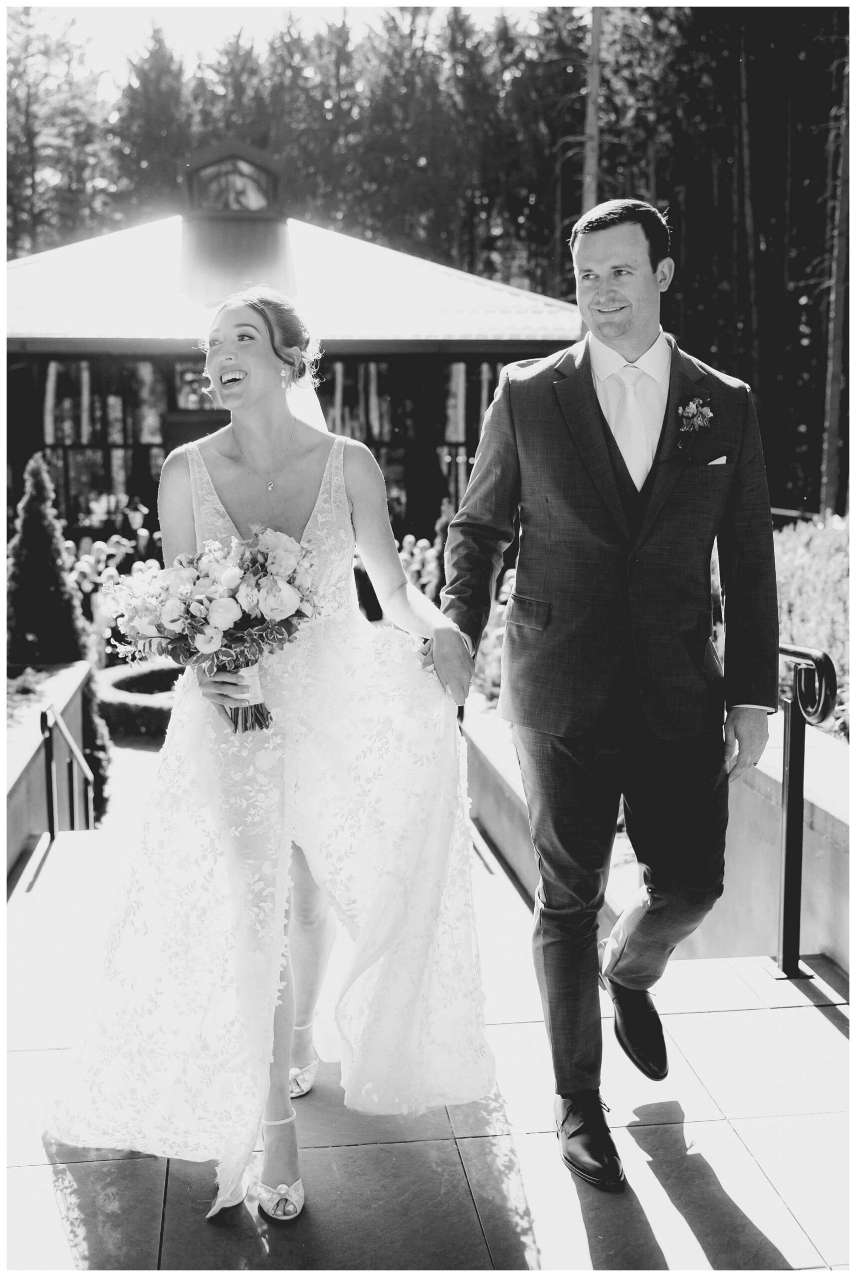 bride and groom after ceremony at shepherd's hollow golf club in clarkston michigan by josh and andrea photography 