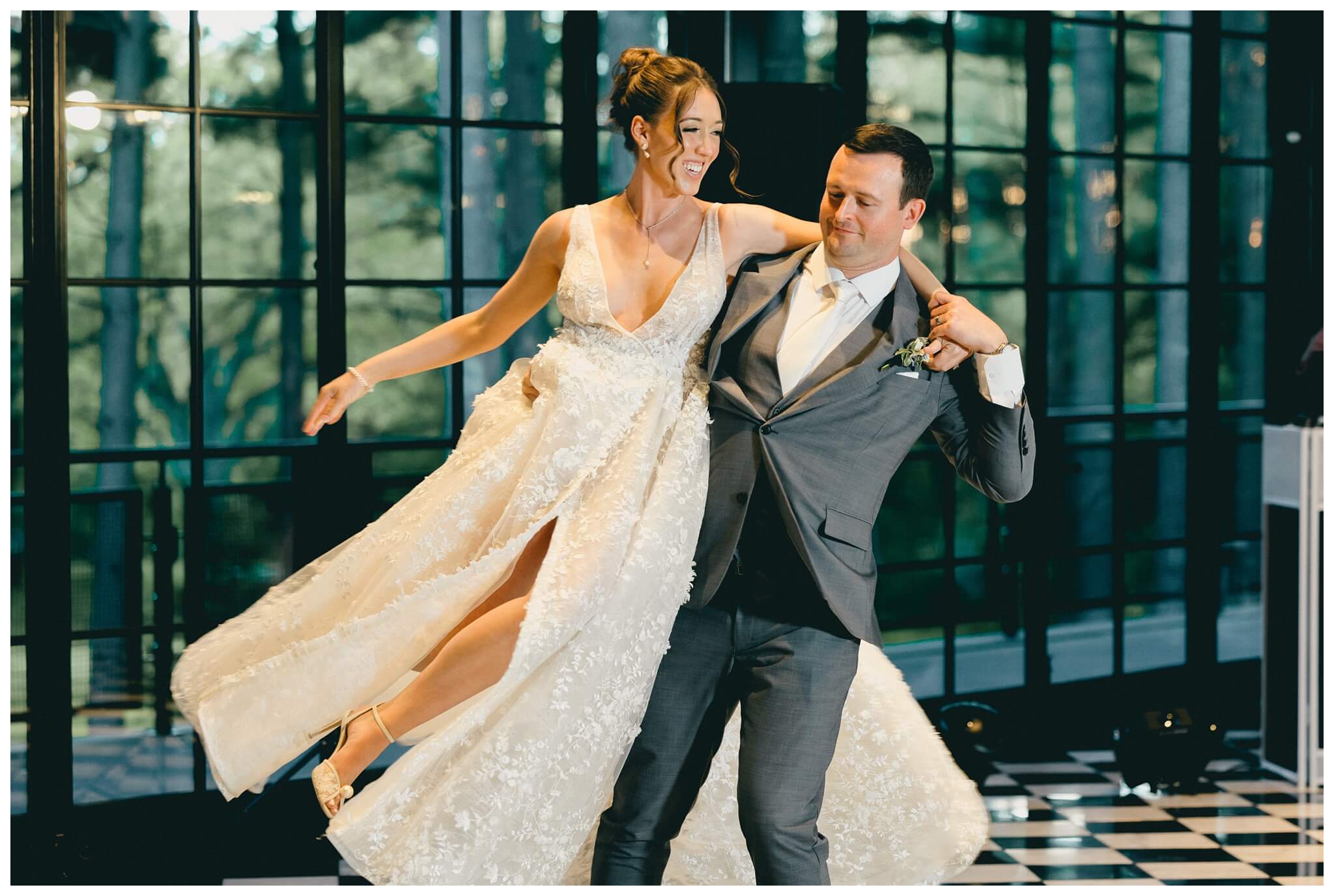 bride and groom dancing at shepherd's hollow golf club in clarkston michigan by josh and andrea photography 