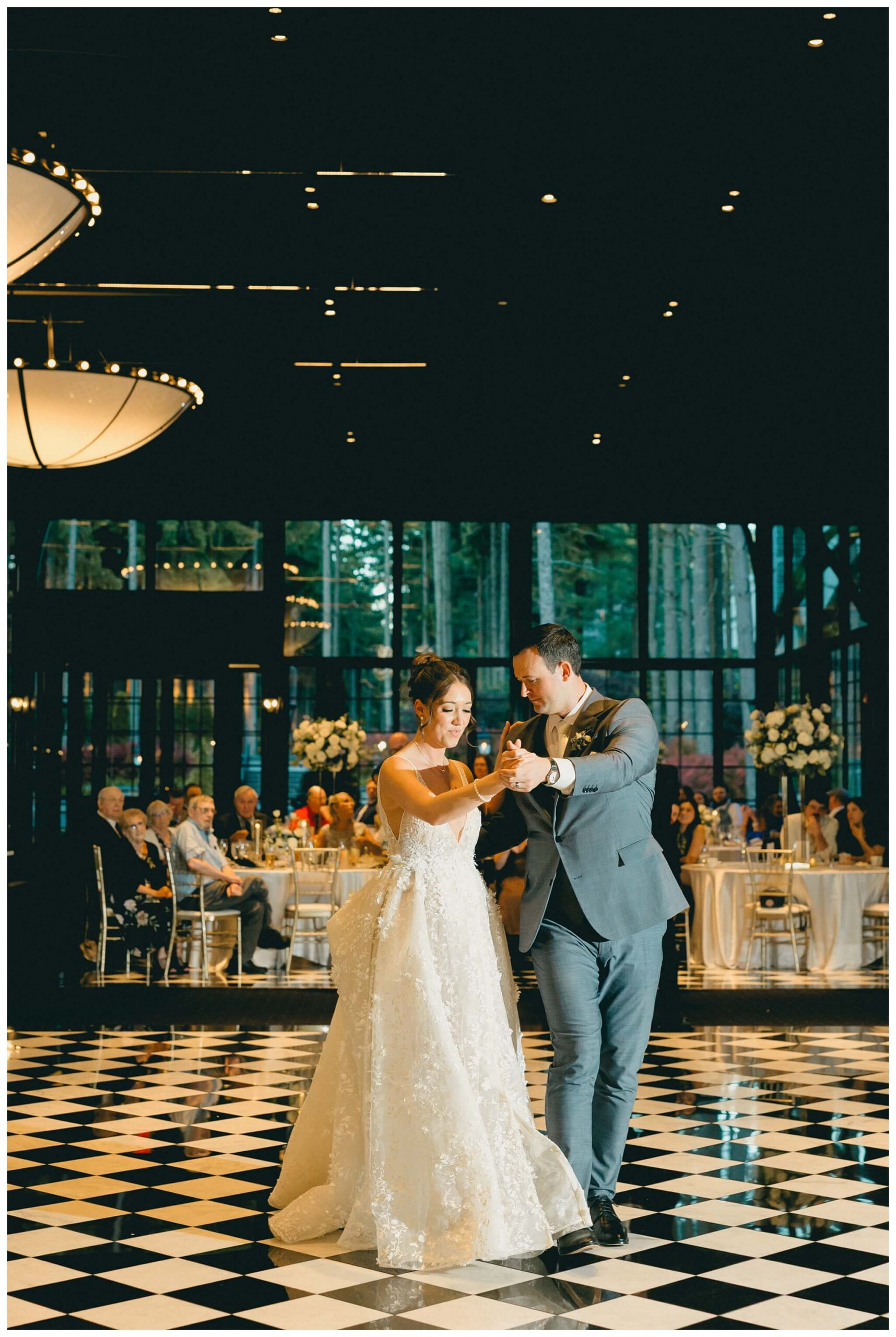bride and groom first dance at shepherd's hollow golf club in clarkston michigan by josh and andrea photography 