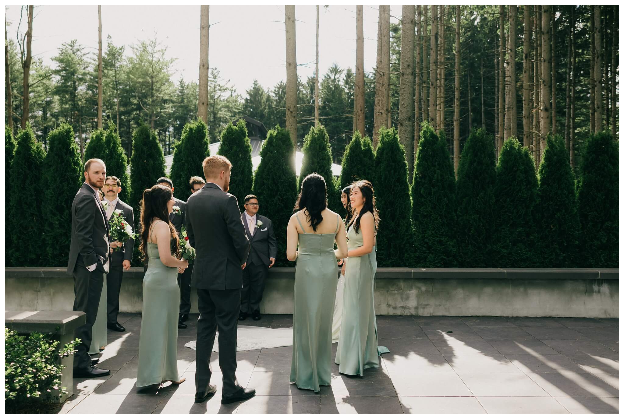 bridal party at the ceremony at Shepherd's hollow golf club near clarkston michigan by josh and andrea photography 