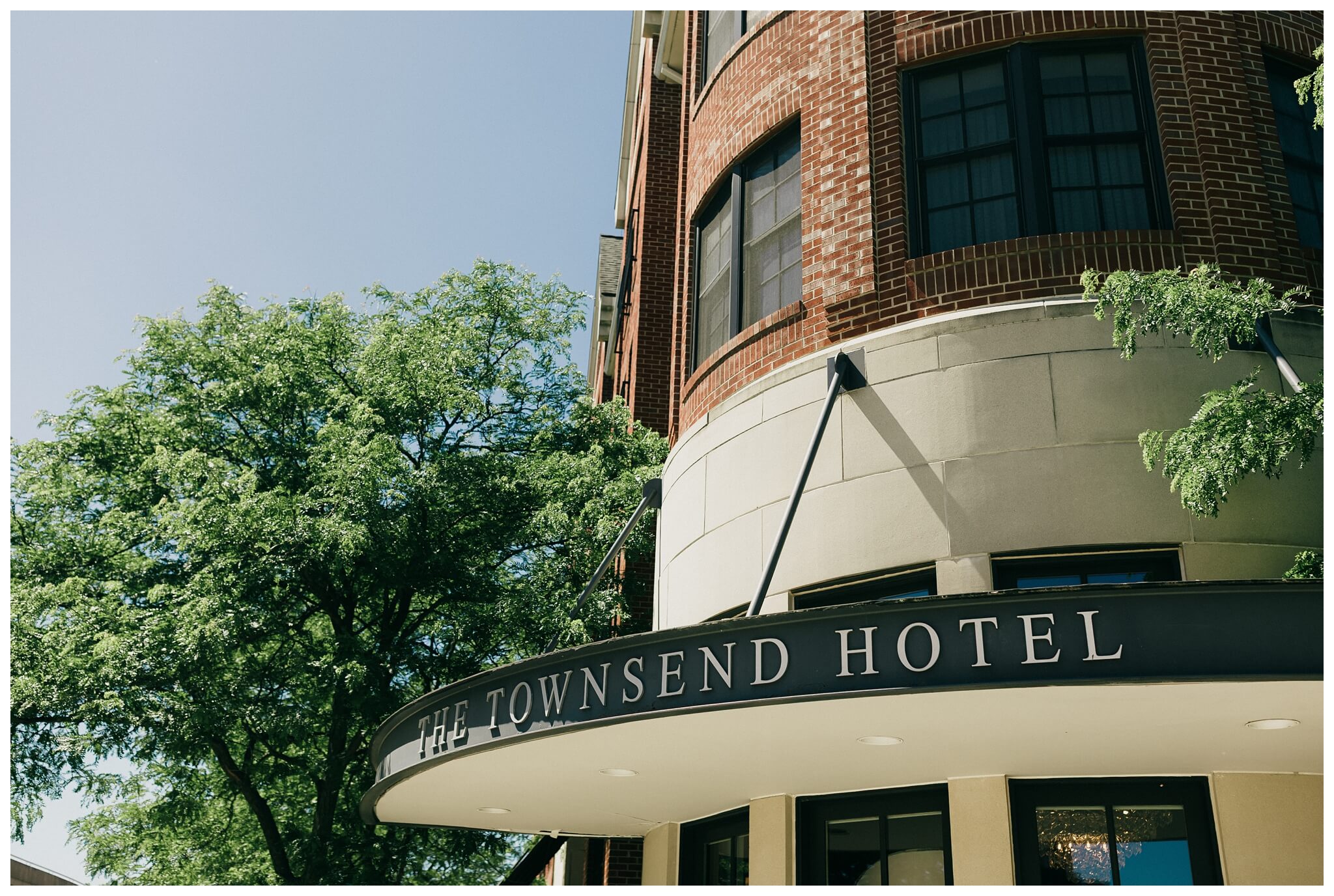 bride and groom getting ready at the townsend hotel by josh and andrea photography 