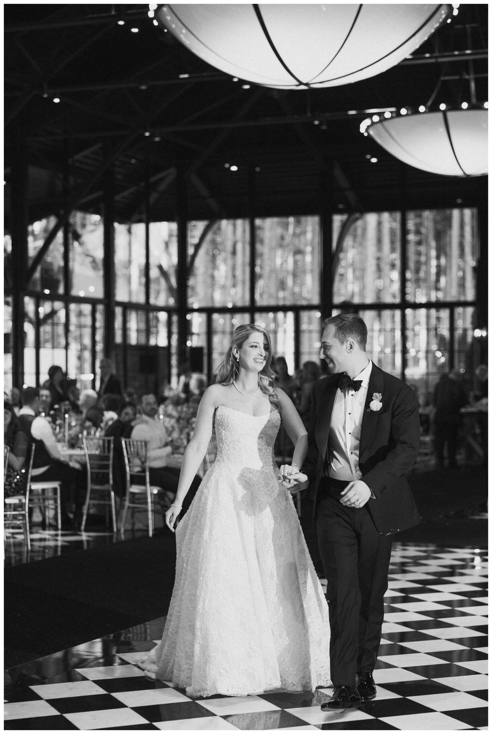 bride and groom first dance at Shepherd's hollow golf club near clarkston michigan by josh and andrea photography 