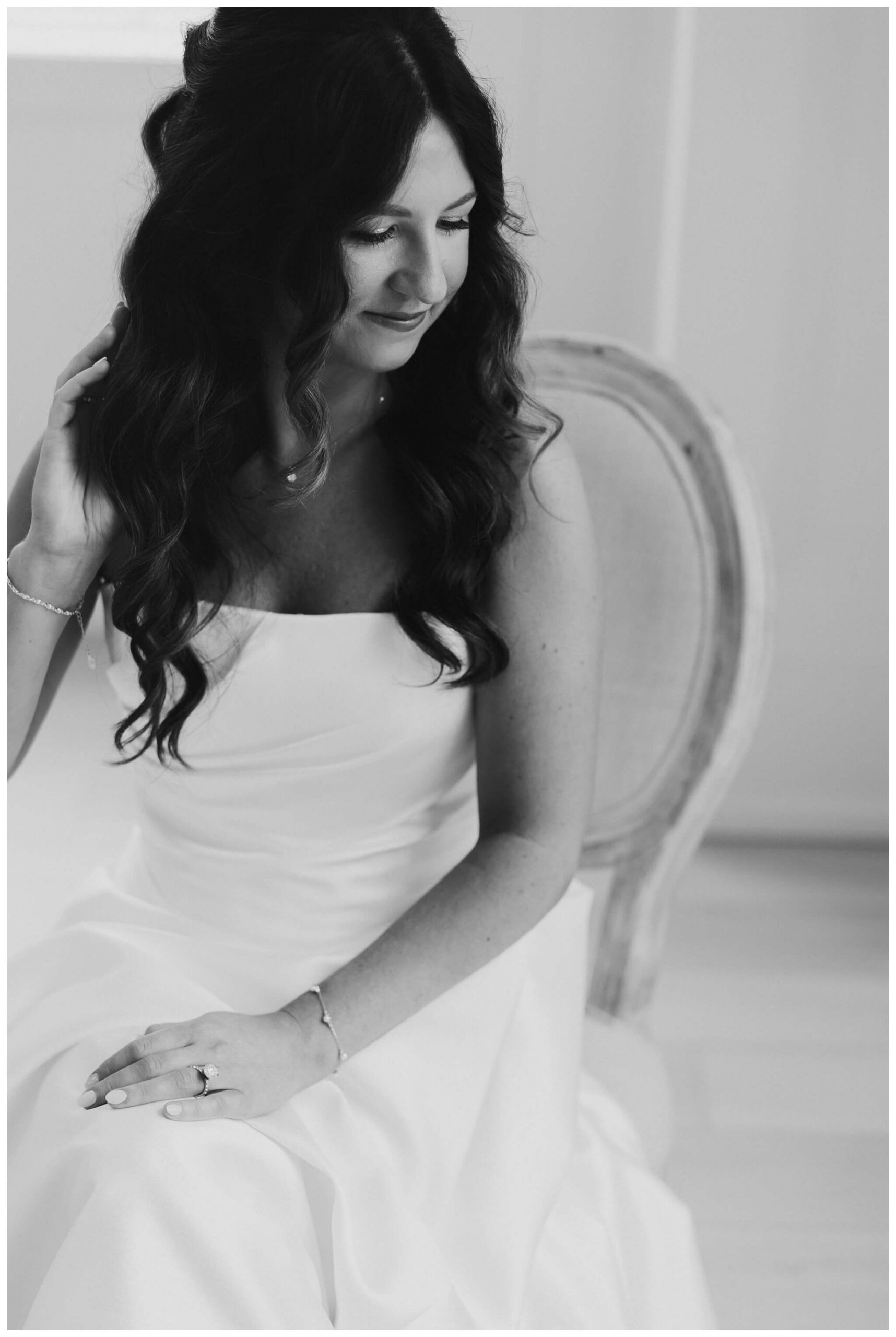 bride getting ready at white barn wedding at etre farms by josh and andrea photography 