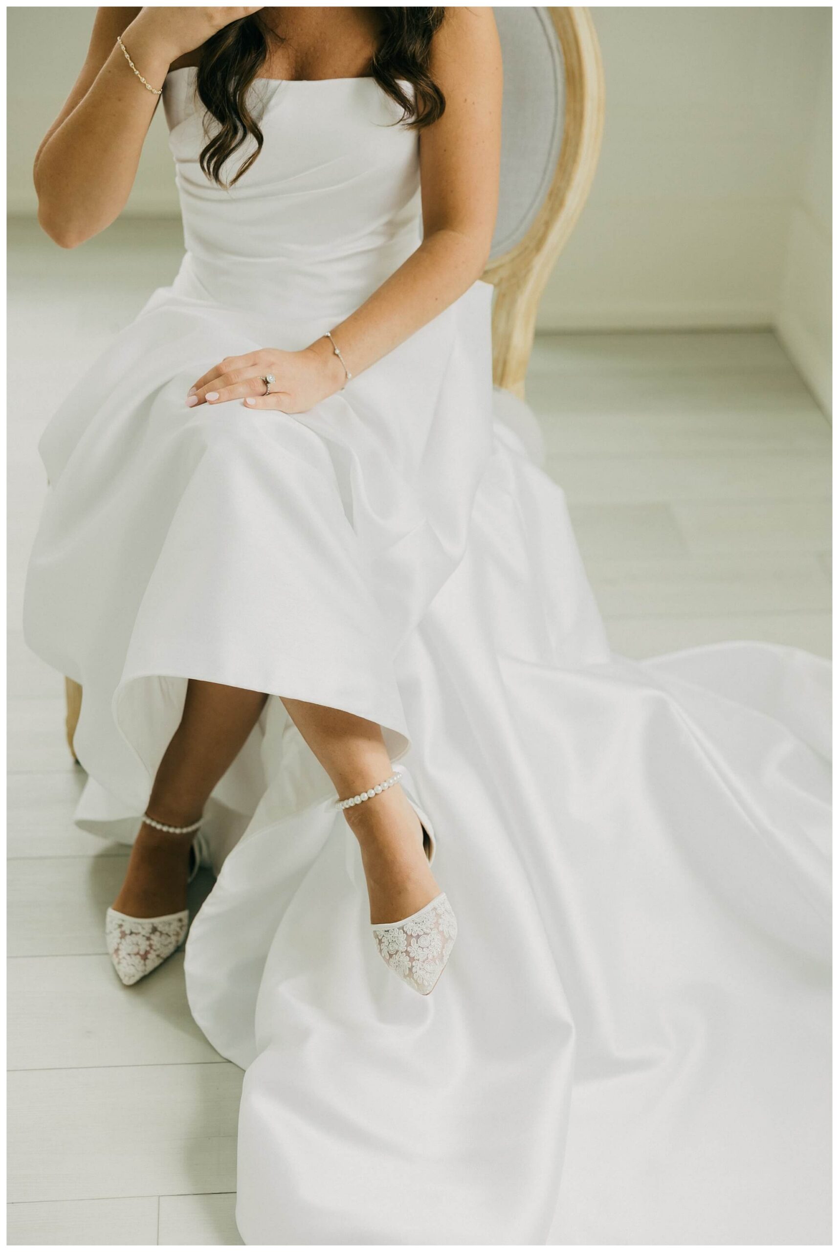 bride getting ready at white barn wedding at etre farms by josh and andrea photography 