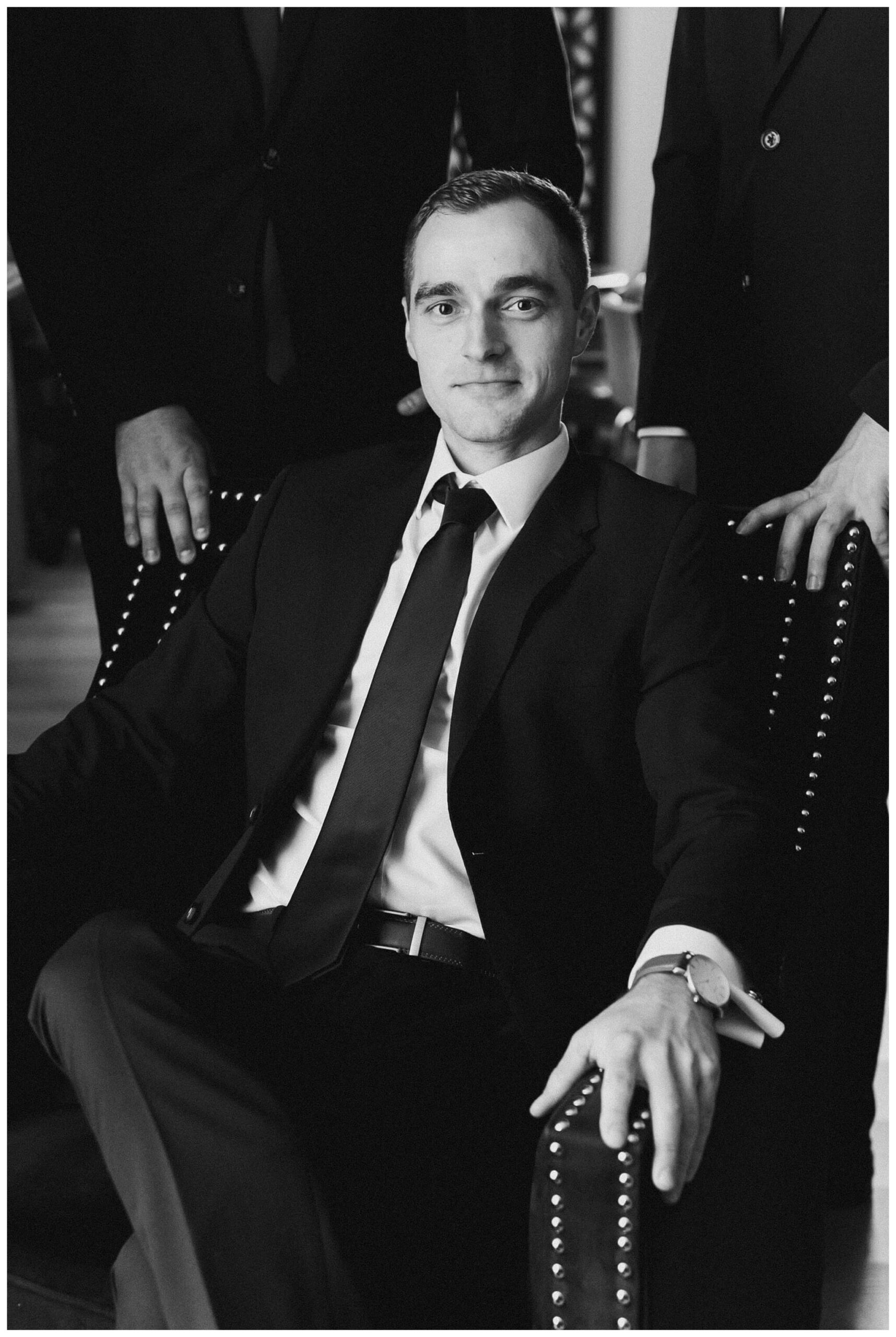 groom getting ready at white barn wedding at etre farms by josh and andrea photography 