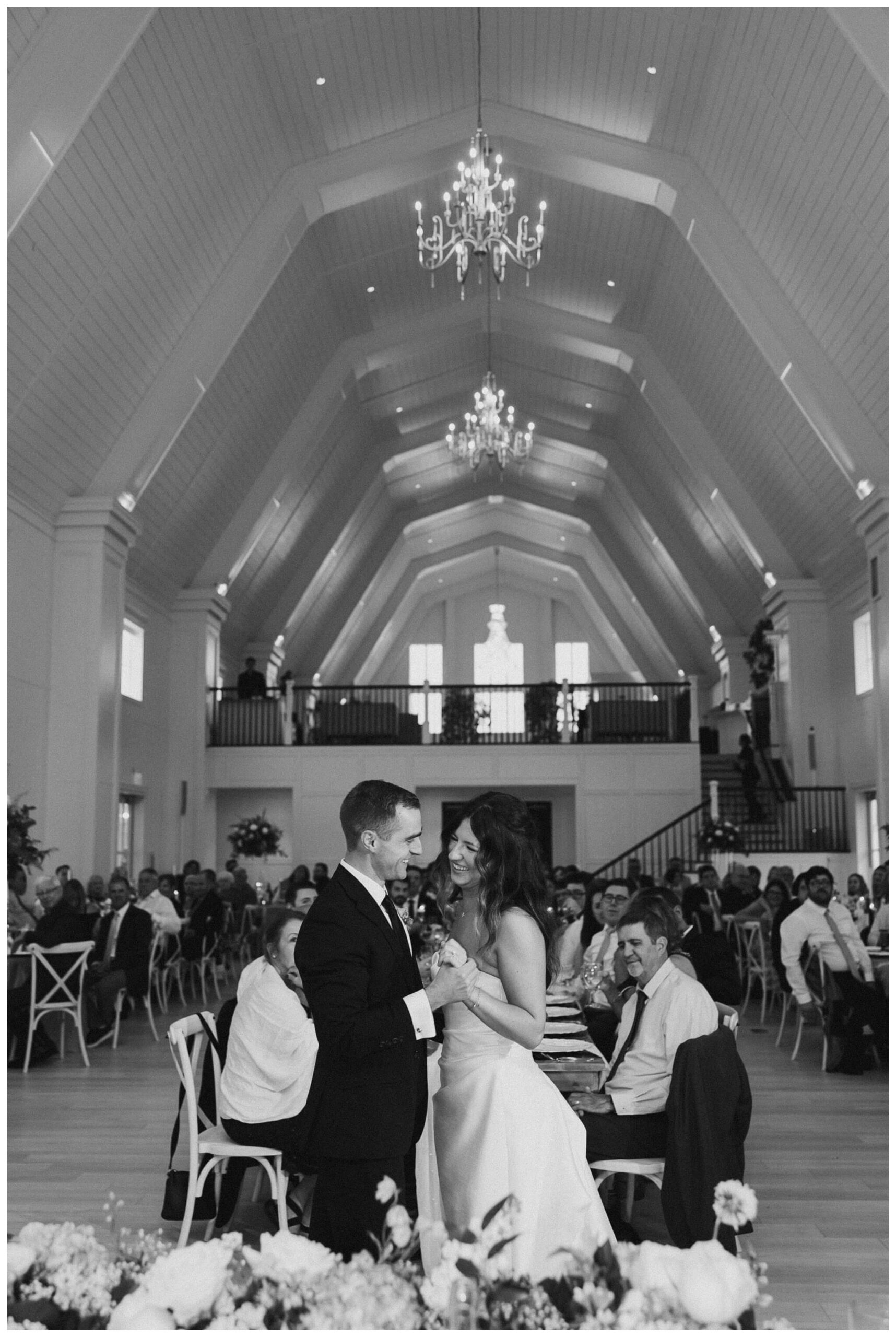 bride and groom dance at white barn wedding at etre farms by josh and andrea photography 