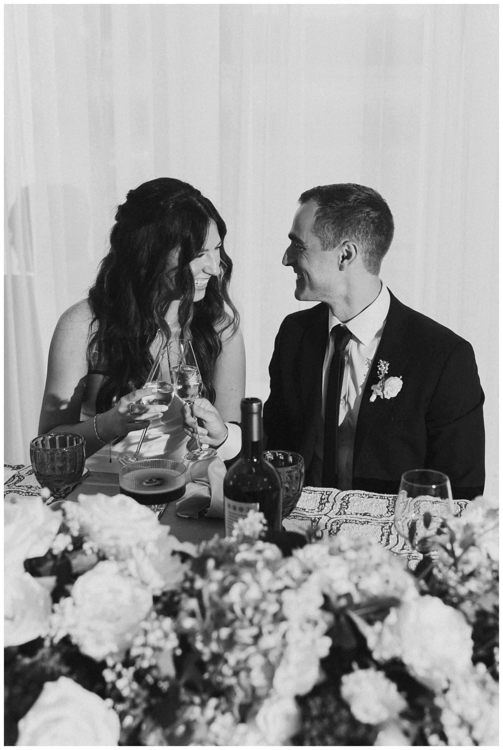 bride and groom at white barn wedding at etre farms by josh and andrea photography 