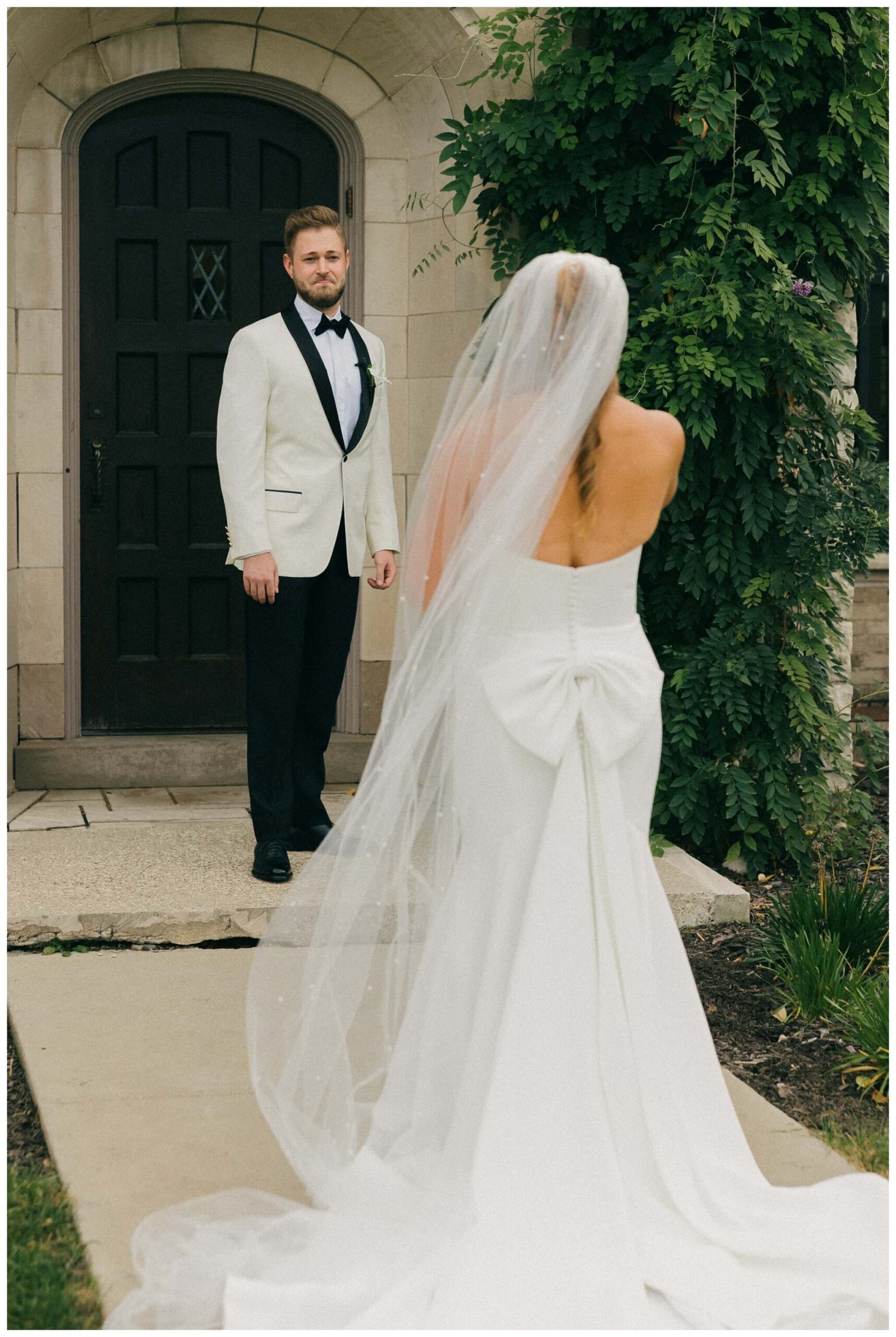 bride and groom share first look at venue3two wedding by josh and andrea photography