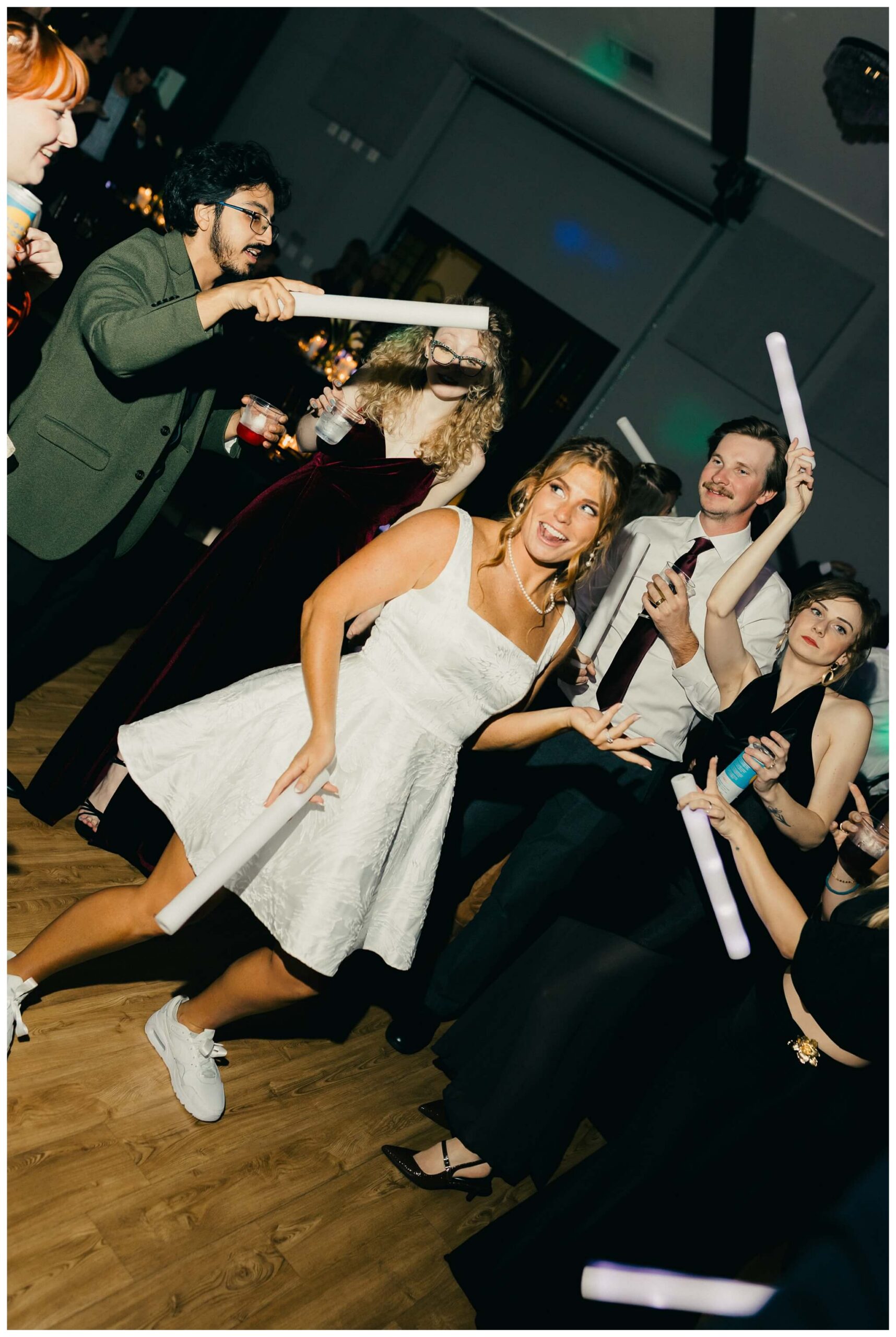 bride dancing at venue3two wedding by josh and andrea photography